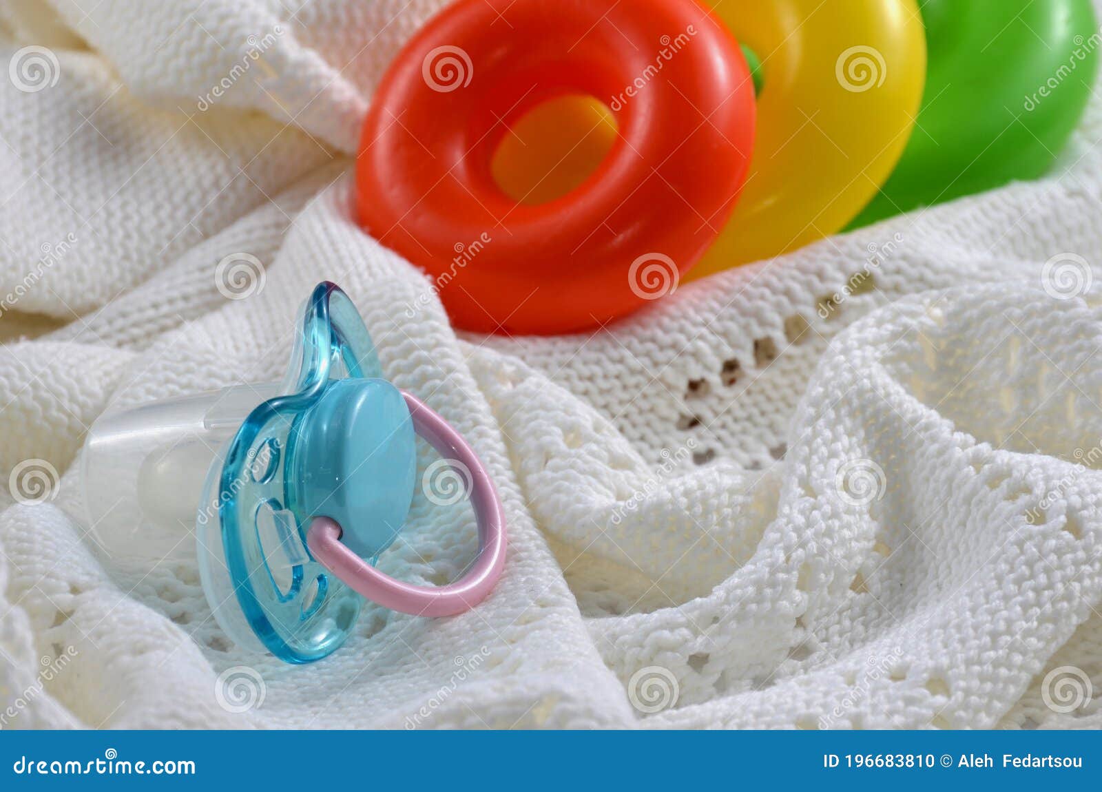 Baby Pacifier and Toys on the Blanket Stock Photo - Image of toys, bath ...
