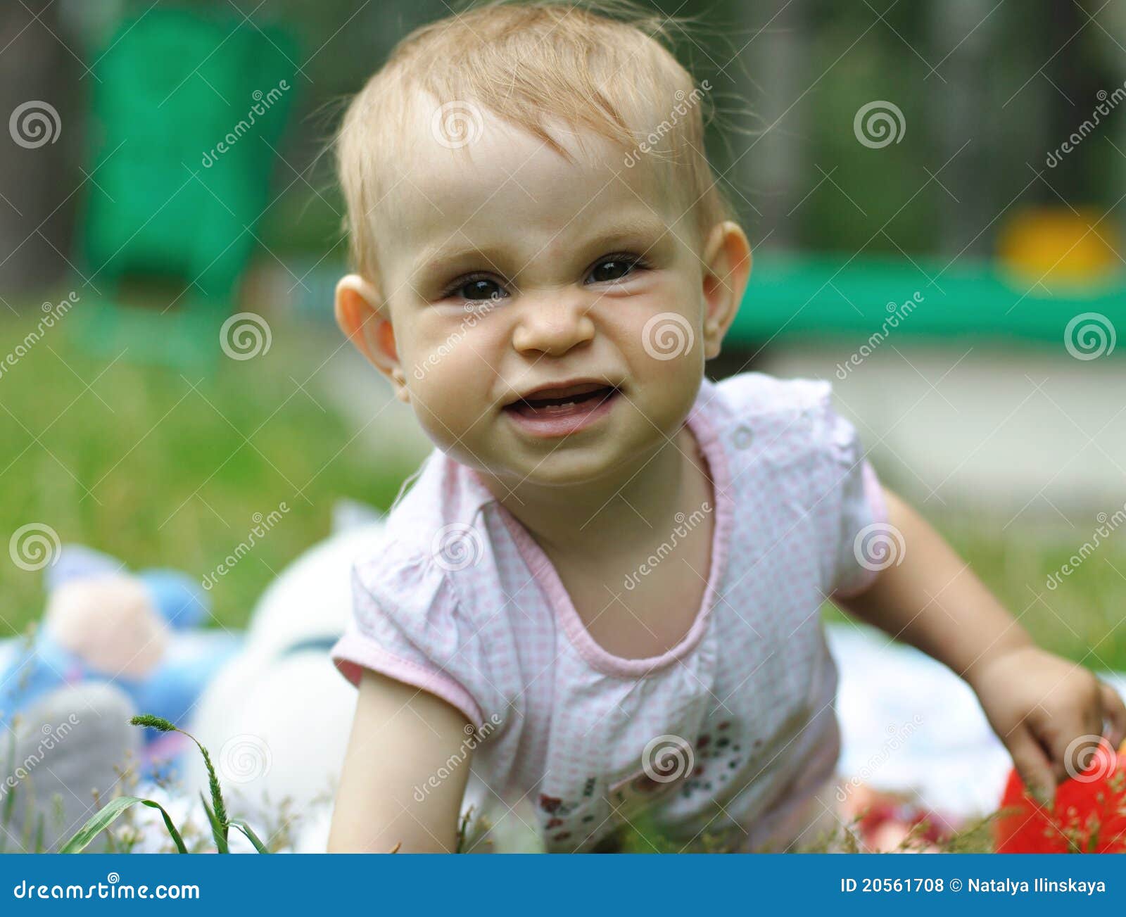 Baby playing on the lawn stock photo. Image of smile - 20561708