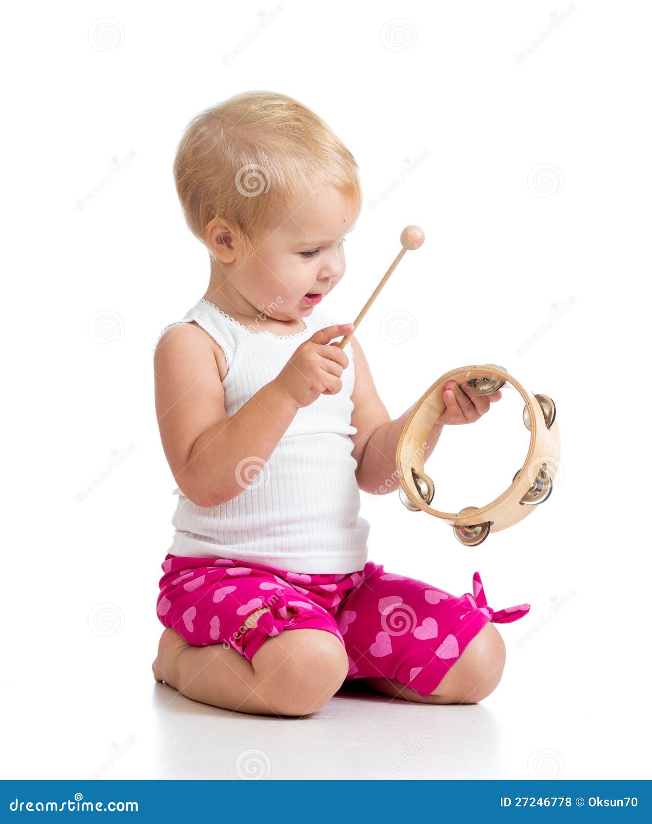 Baby Playing with Musical Toy on White Background Stock Photo Image