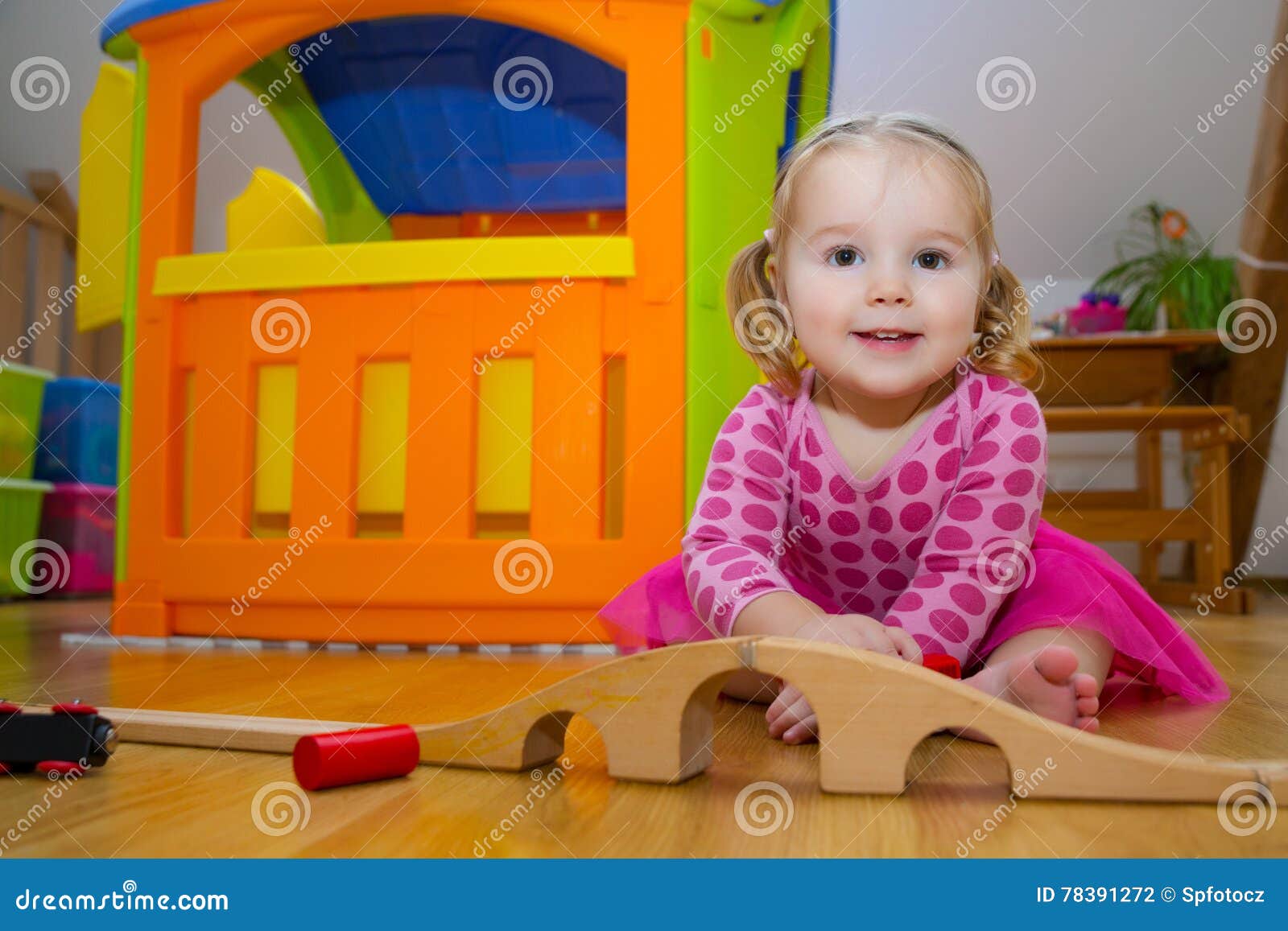 Baby playing with toys stock photo. Image of newborn - 78391272