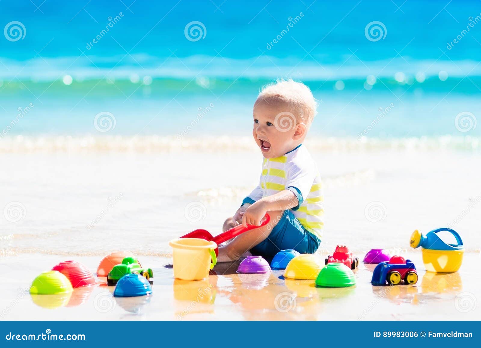 Baby Playing on Tropical Beach Digging in Sand Stock Photo - Image