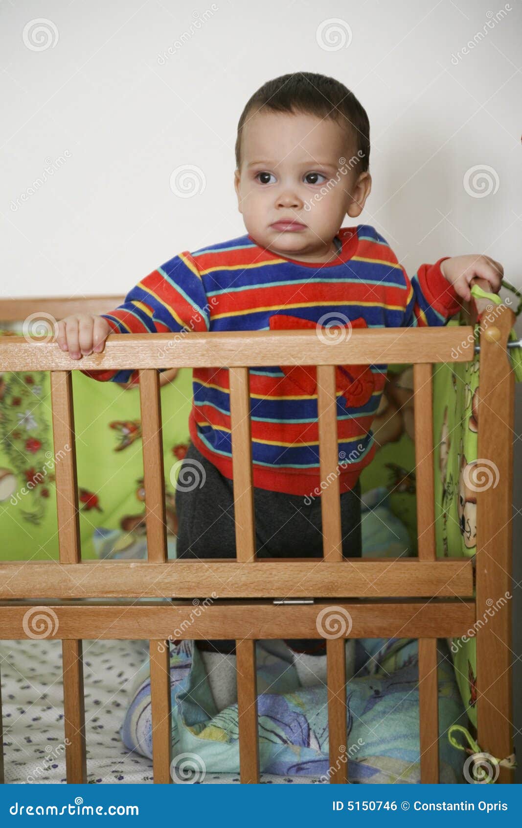 Baby in playpen stock photo. Image of small, holding, playpen 5150746
