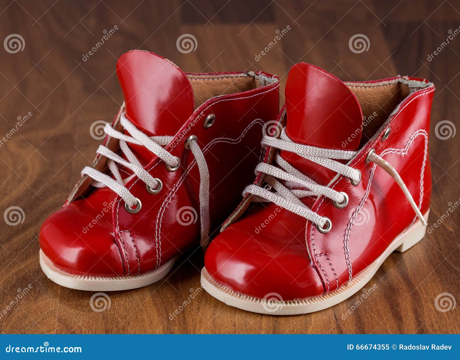 Baby Red Shoes on a Wooden Floor. Stock Image - Image of color, classic ...