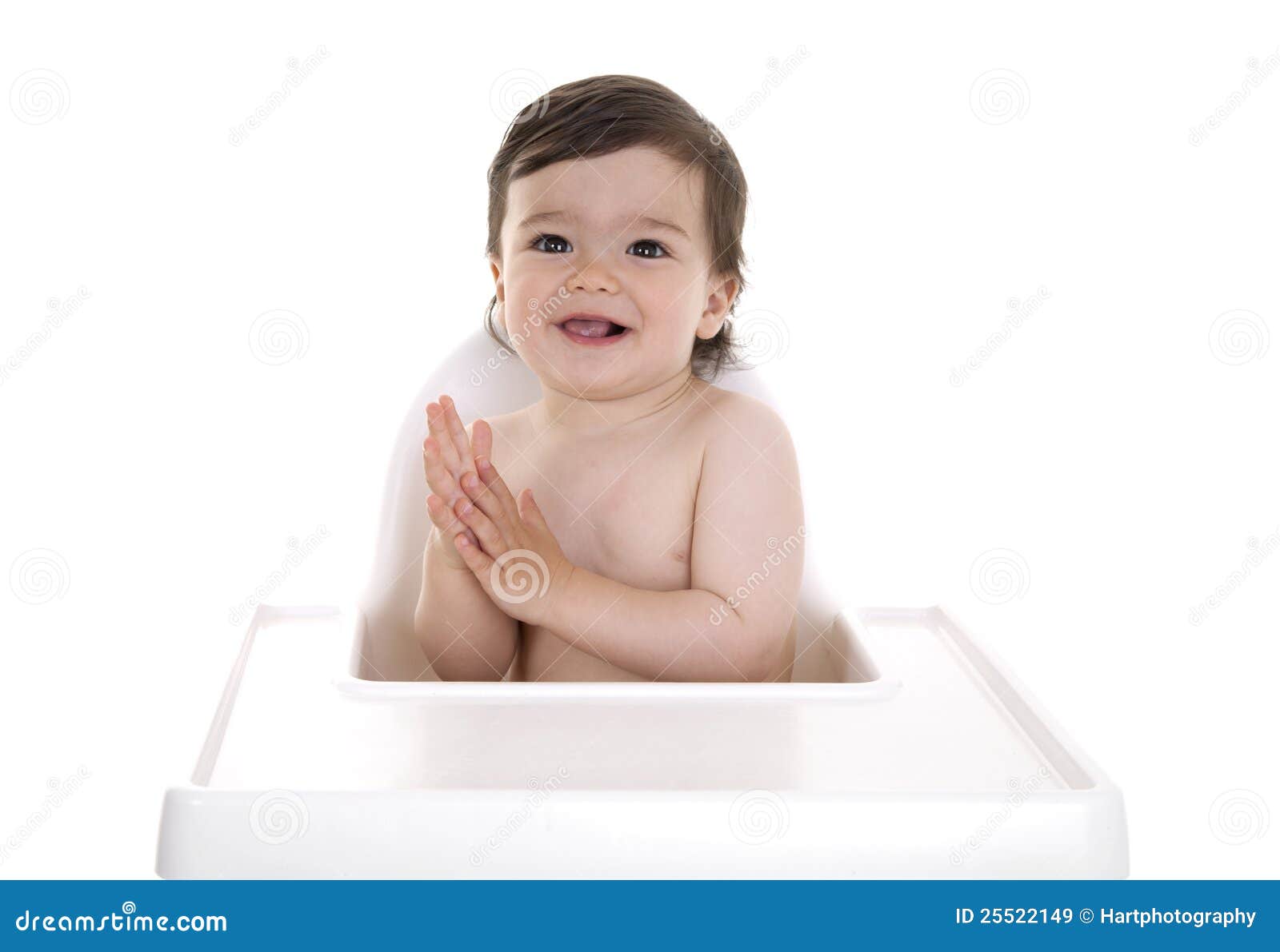 Baby Rubbing Hands Together Stock Image 