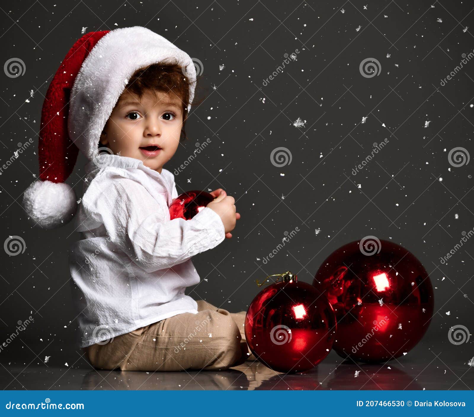 Baby in Santa Hat with Xmas Tree Ball on Snowfall Background Stock Photo -  Image of size, celebration: 207466530