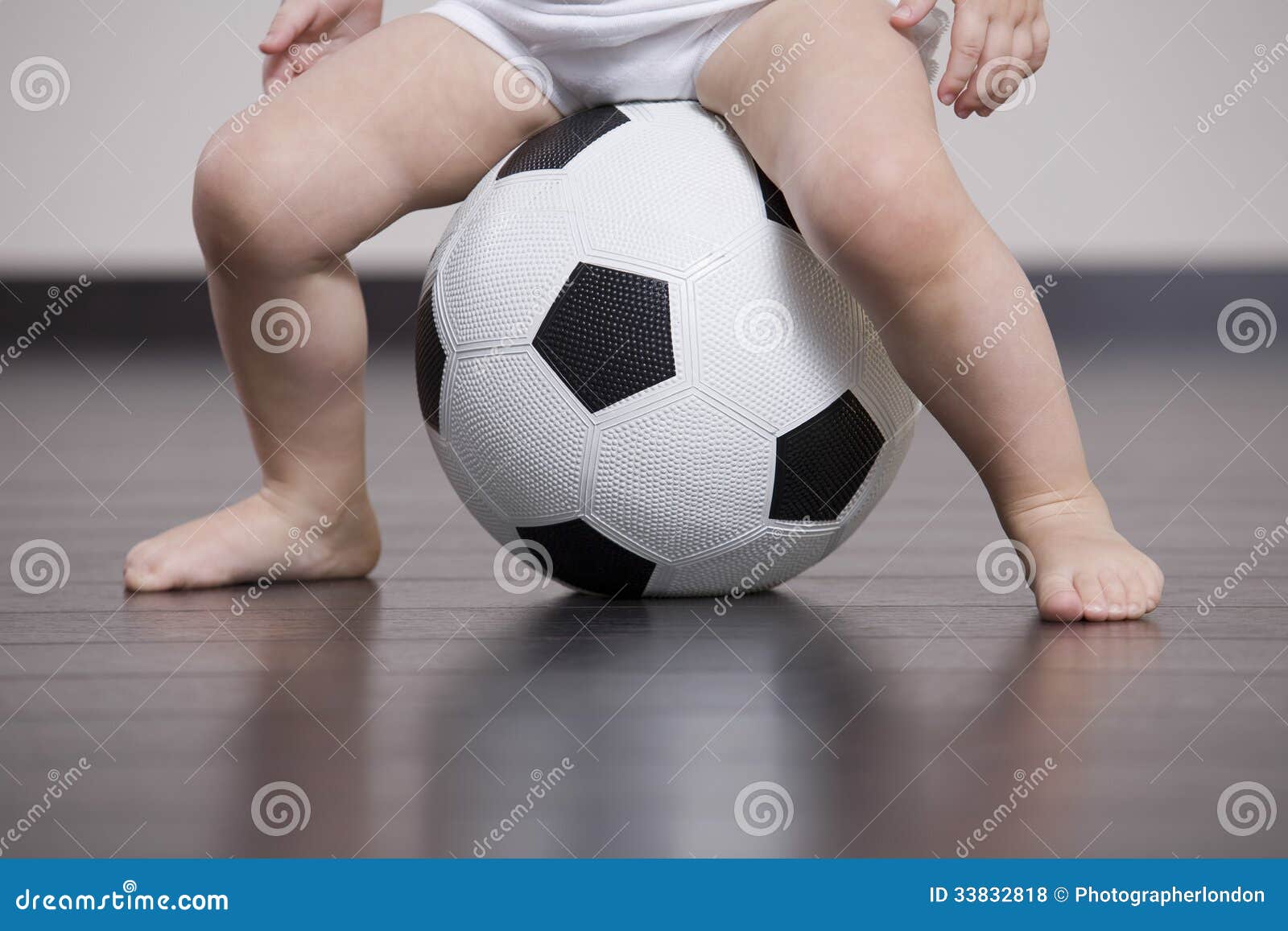 Baby Sitting on Soccer Ball Stock Photo Image of innocence, baby