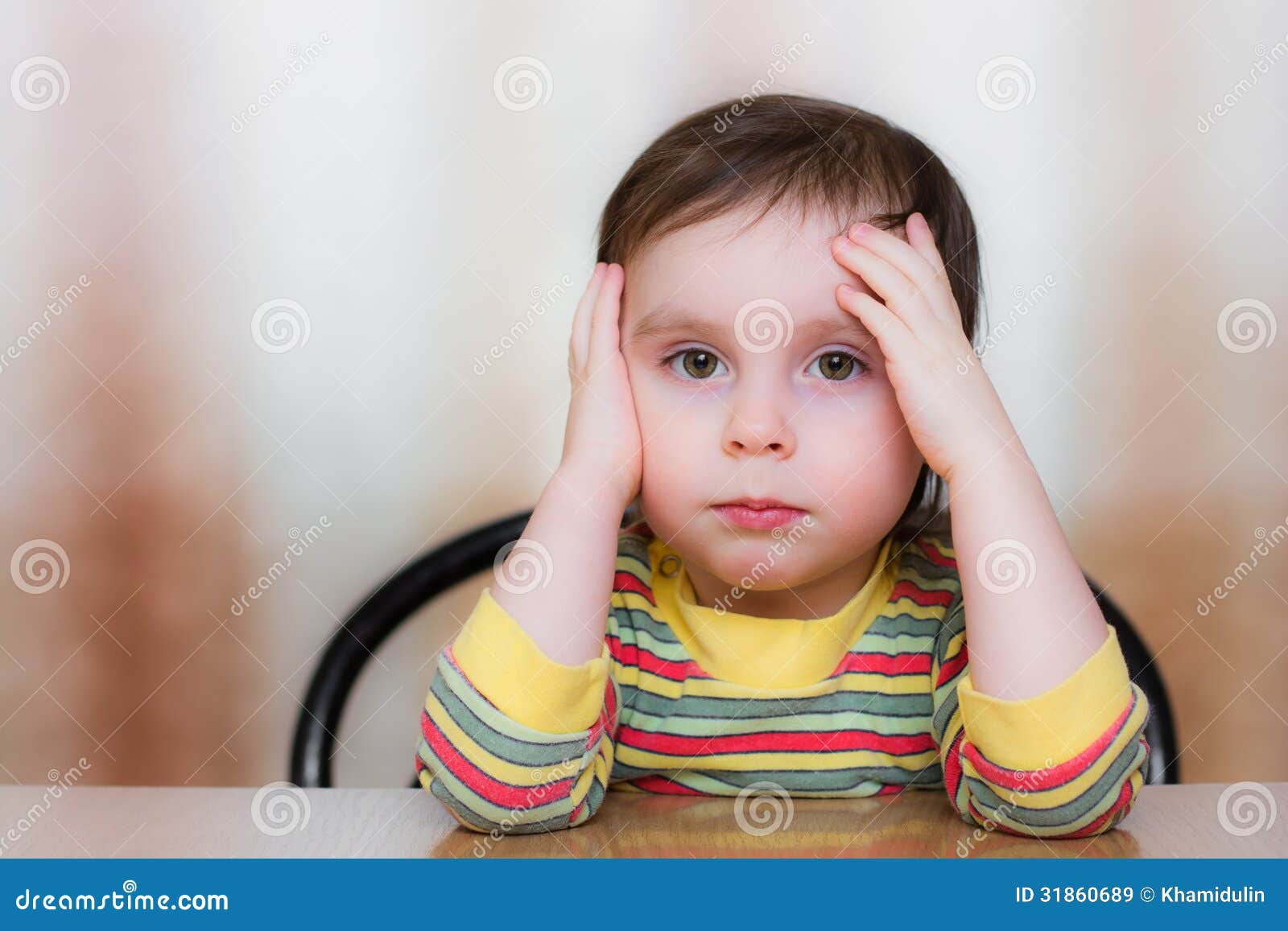 Baby sitting at the table stock image. Image of innocence 31860689
