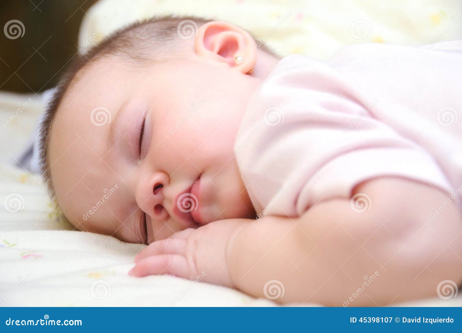 Baby sleeping on the bed stock image. Image of infant 45398107