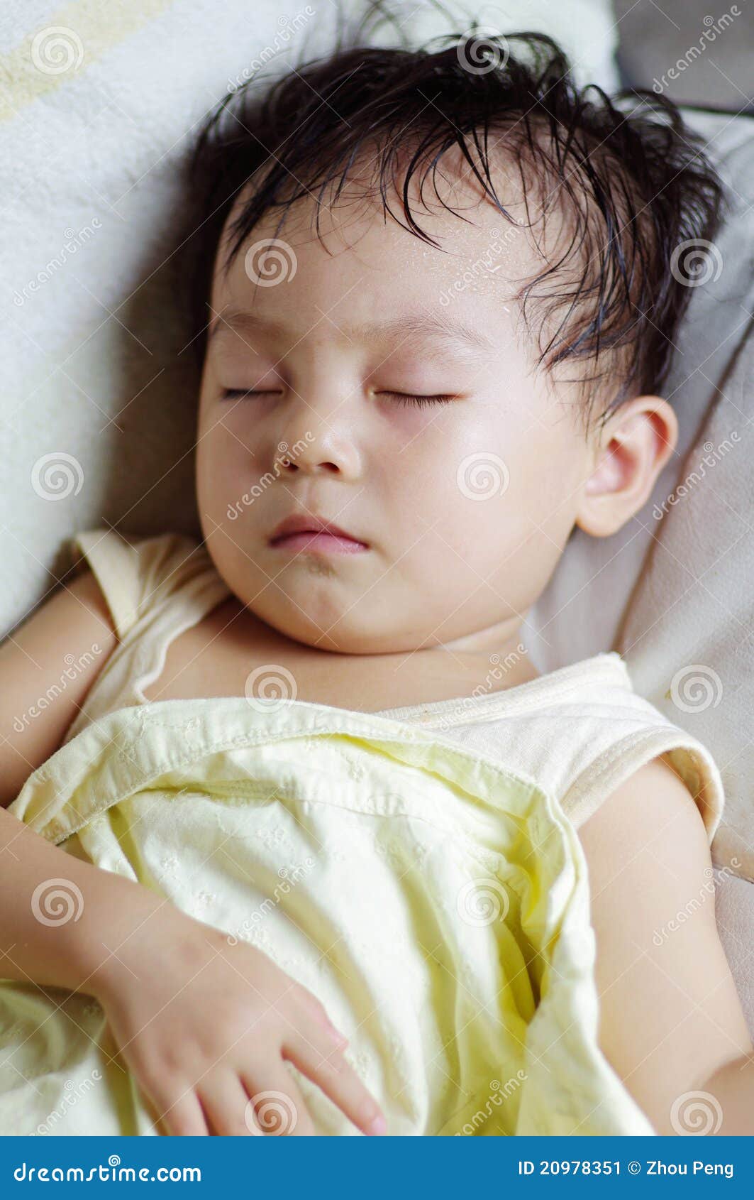 Baby sleeping in sofa stock image. Image of asian, rise 20978351