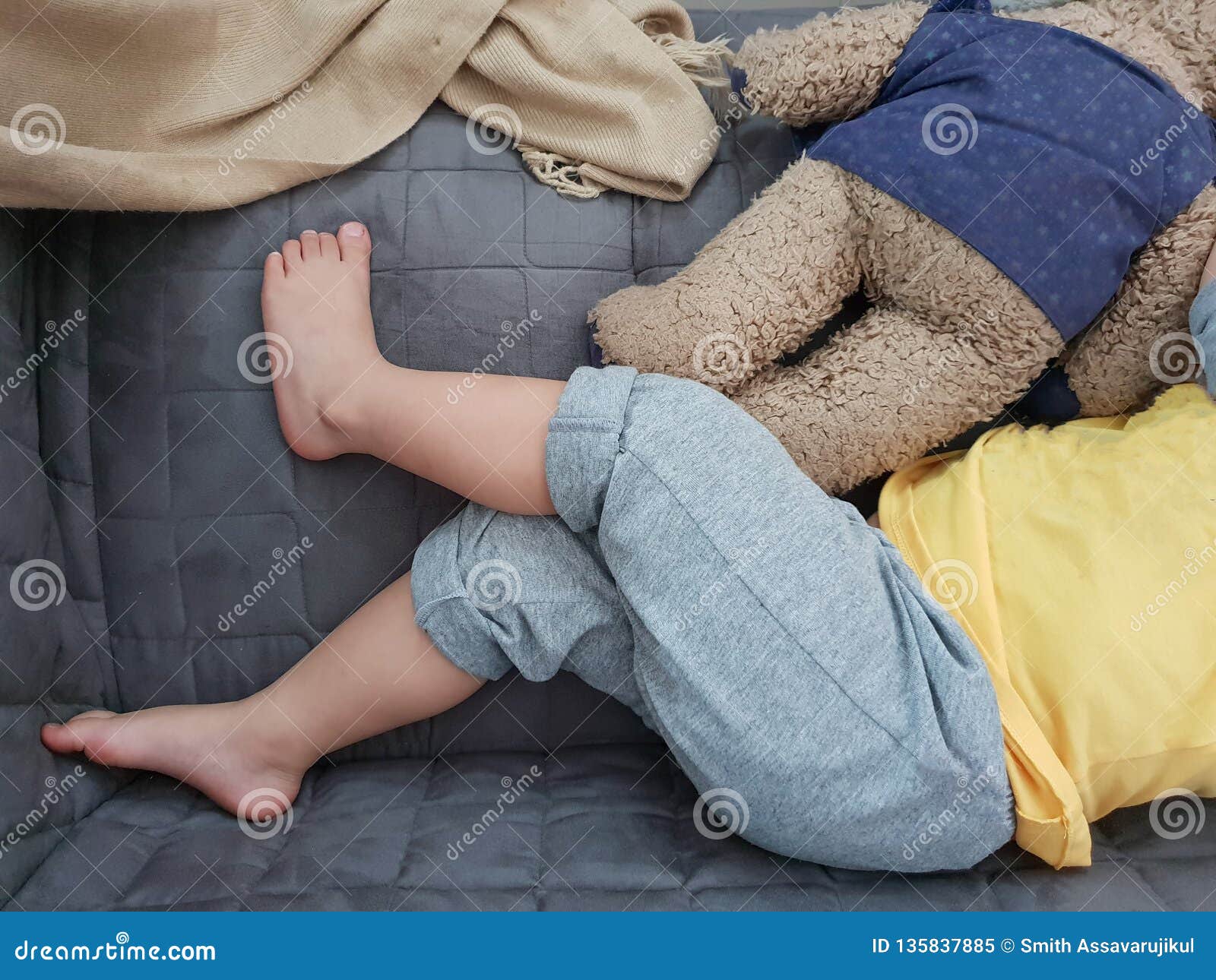 Baby sleeping on sofa stock image. Image of baby, innocent 135837885