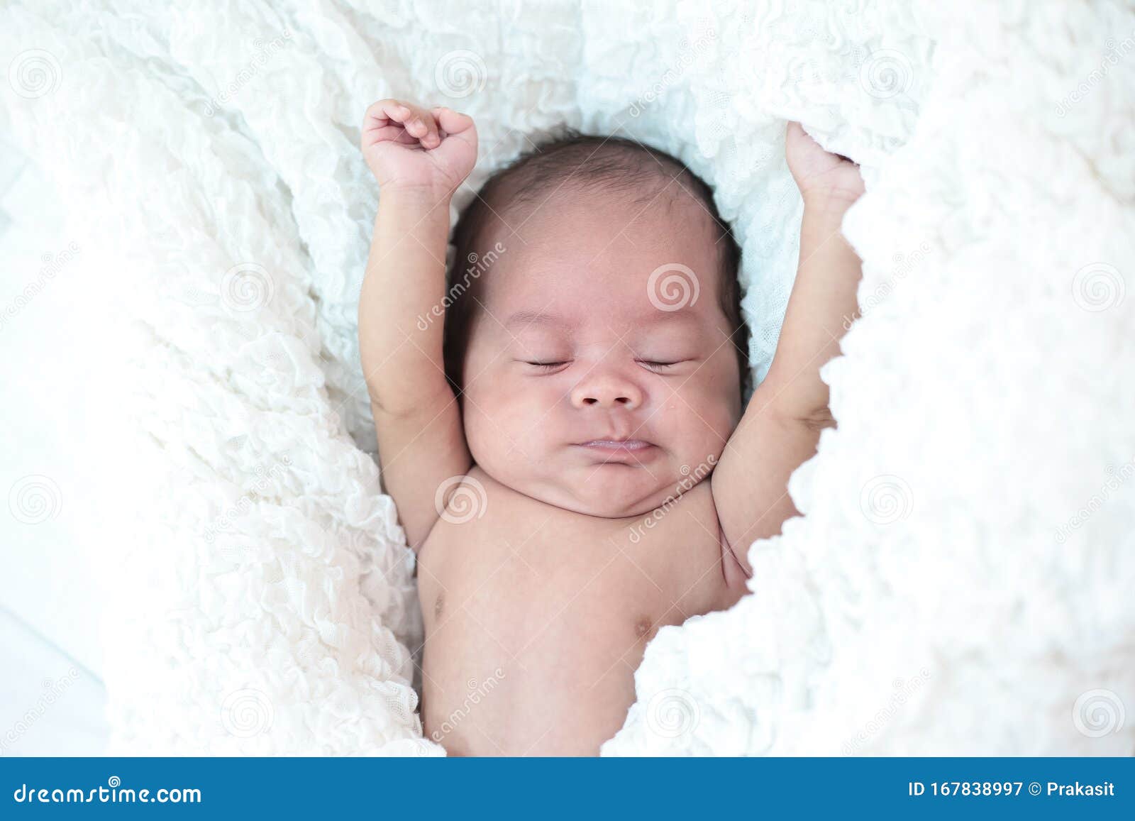 The baby sleeps in the bed stock image. Image of infant 167838997