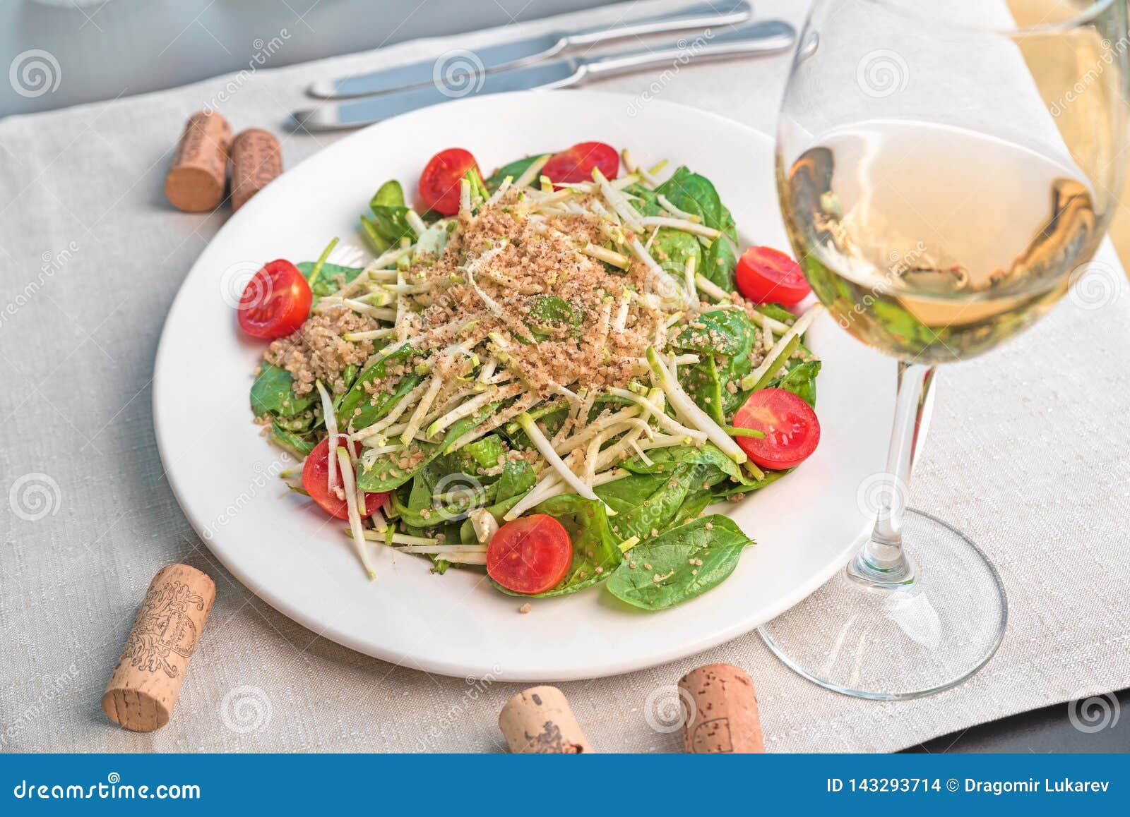 Baby Spinach Salad with Quinoa Served in a White Plate Stock Photo ...