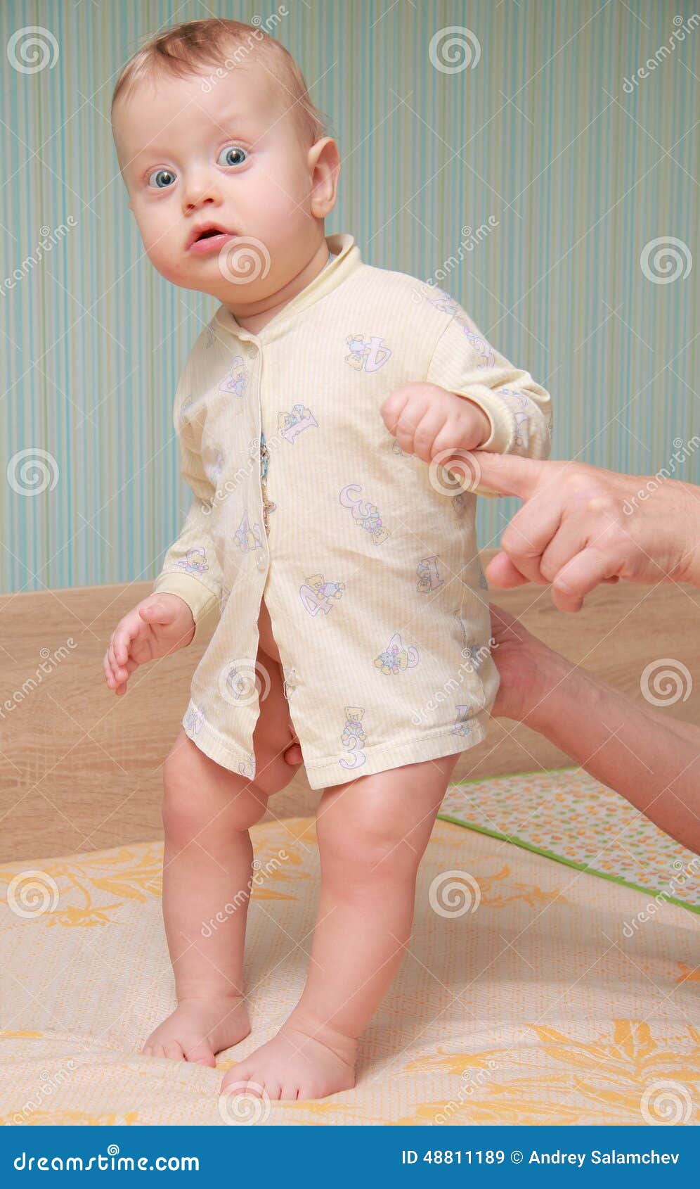 Baby standing on a cot stock image. Image of healthy 48811189