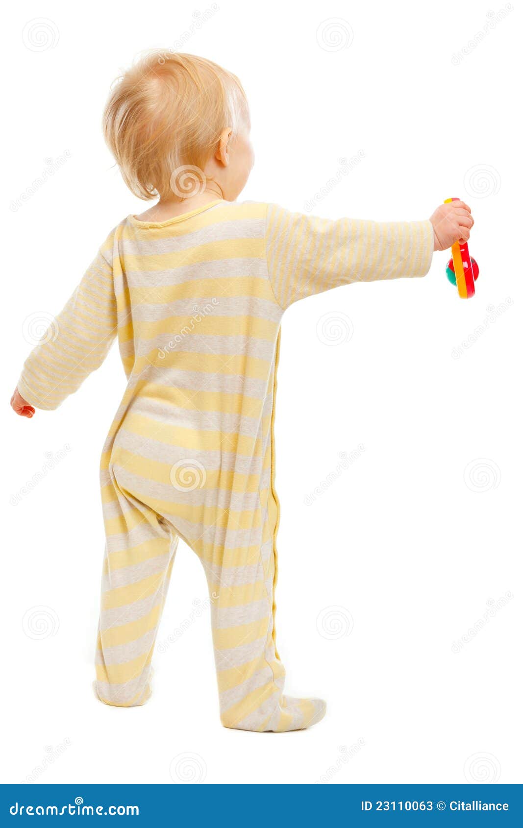 Baby Standing With Rattle Back To Camera Stock Image ...