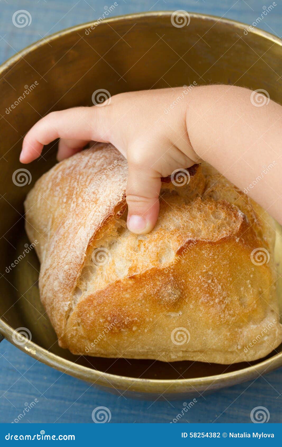 Baby taking bread stock photo. Image of wooden, bread 58254382