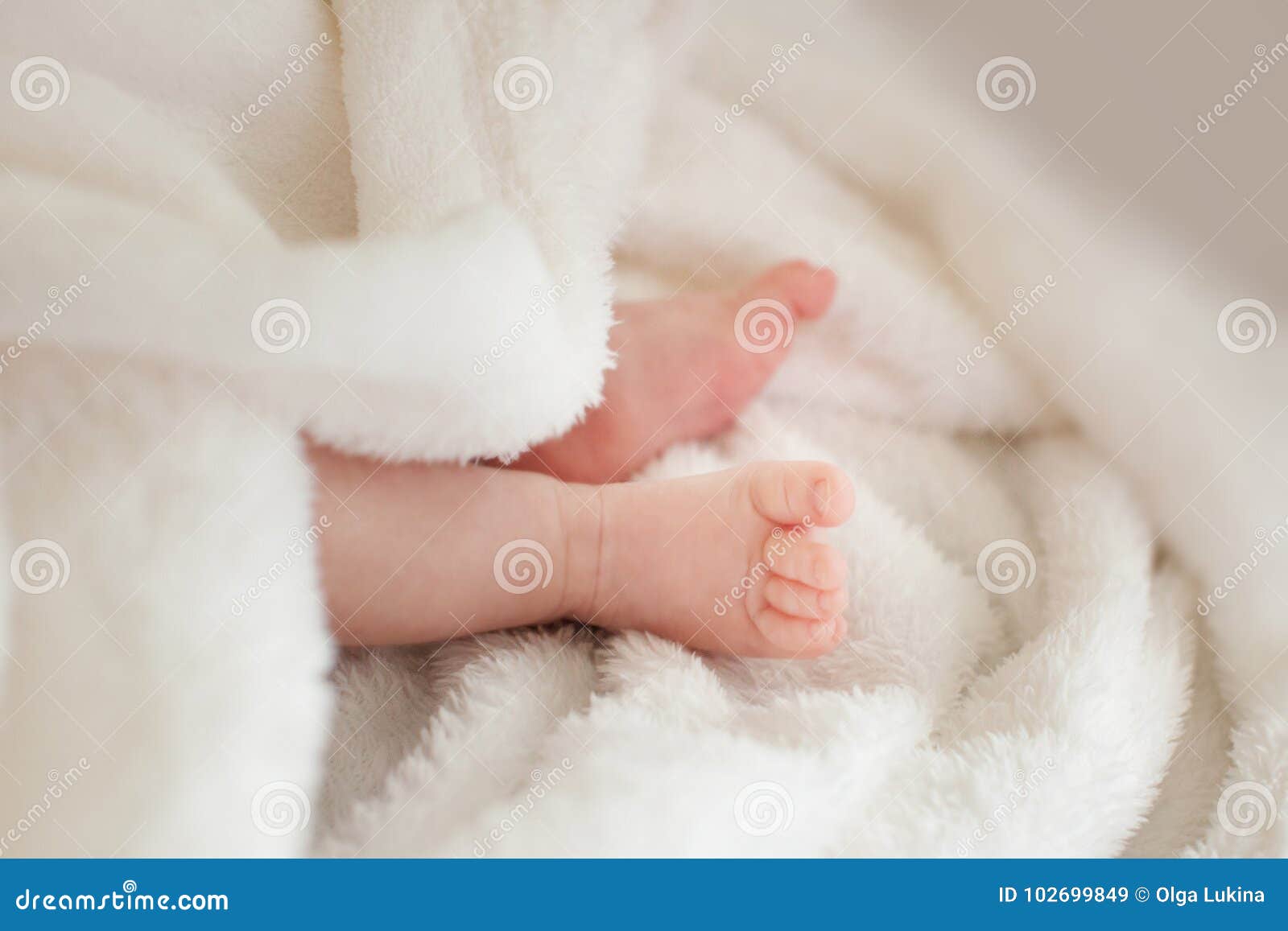 Two Small Baby Legs. Baby in a Towel. Stock Image Image of palm