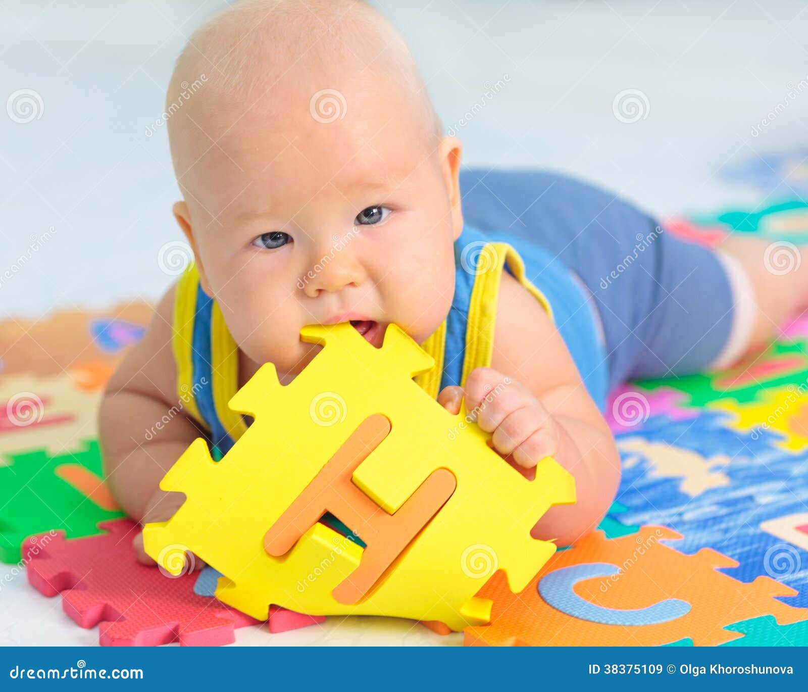 Baby with toy stock image. Image of background, love 38375109