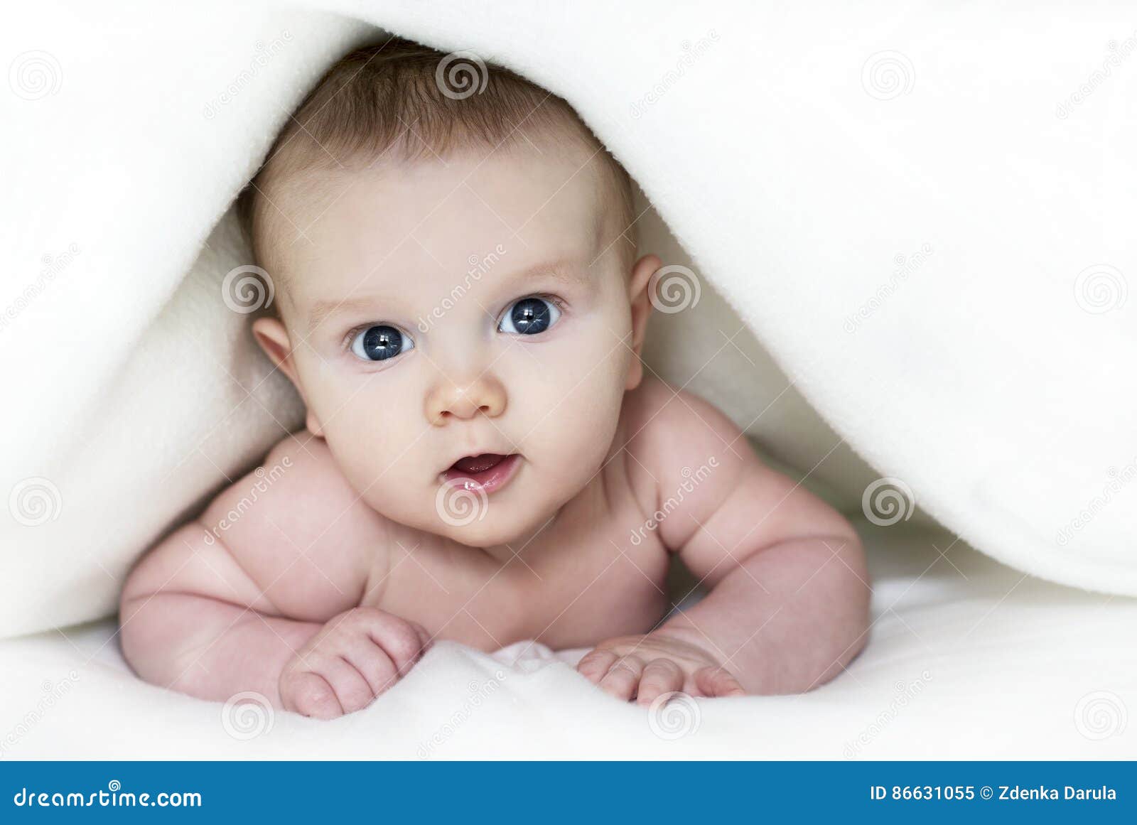 Baby under blanket stock image. Image of person, looking 86631055