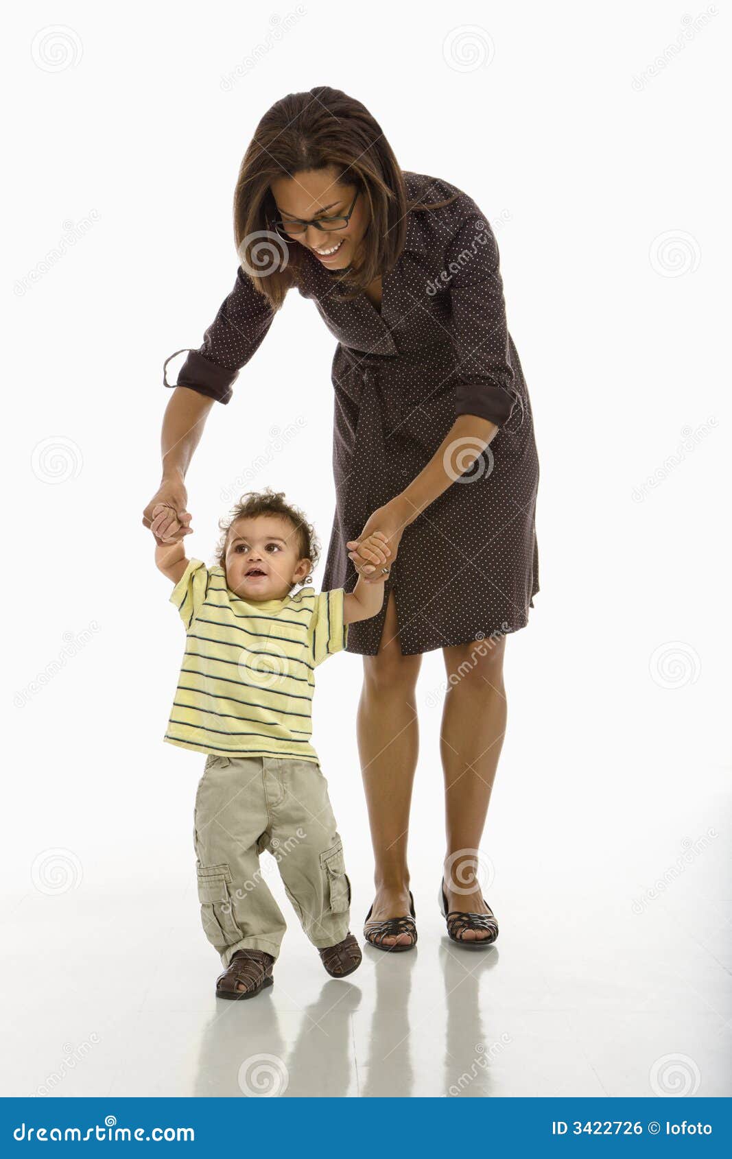 Baby walking with mom. stock photo. Image of color, african - 3422726