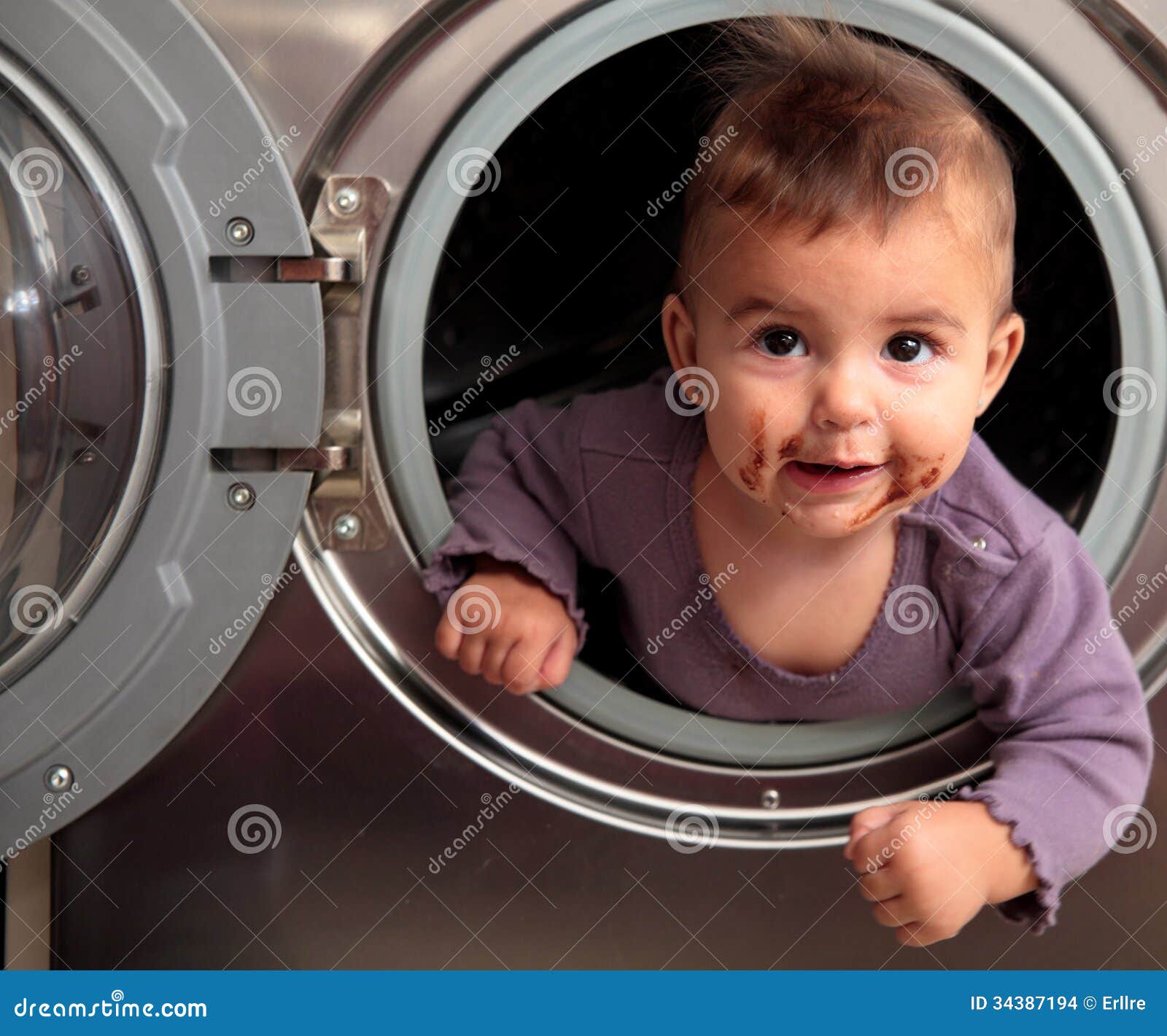 Baby and washer stock photo. Image of looking, cloth 34387194
