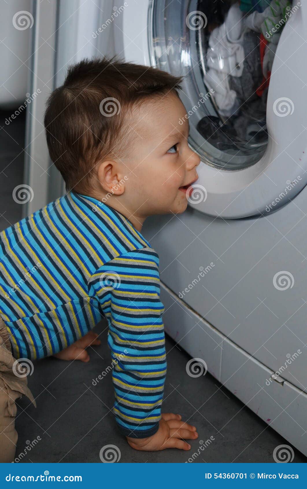 Baby washing machine stock image. Image of looking, washing 54360701