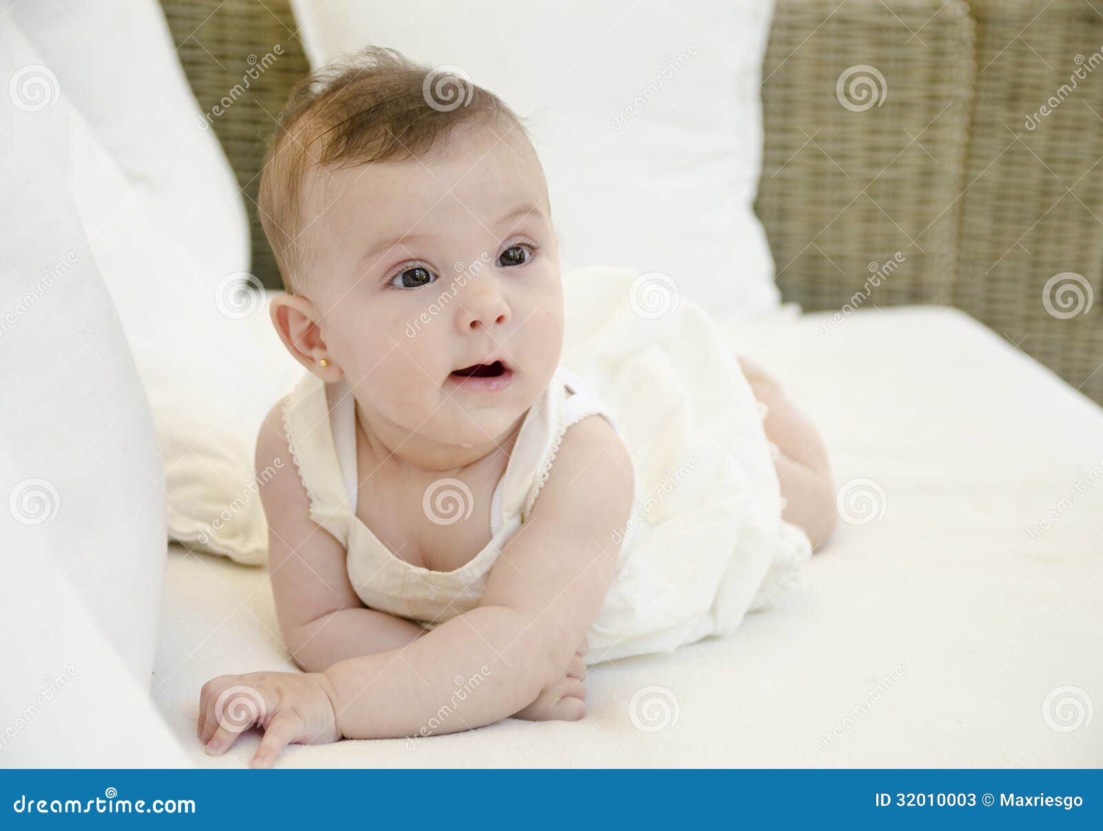 Baby on white sofa. stock image. Image of white, child 32010003