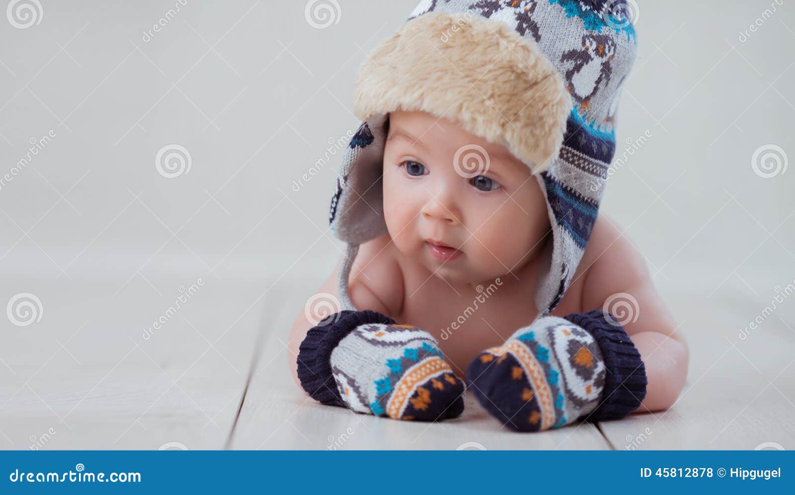 Baby in Winter Hat and Mittens Lying Stock Photo Image of little