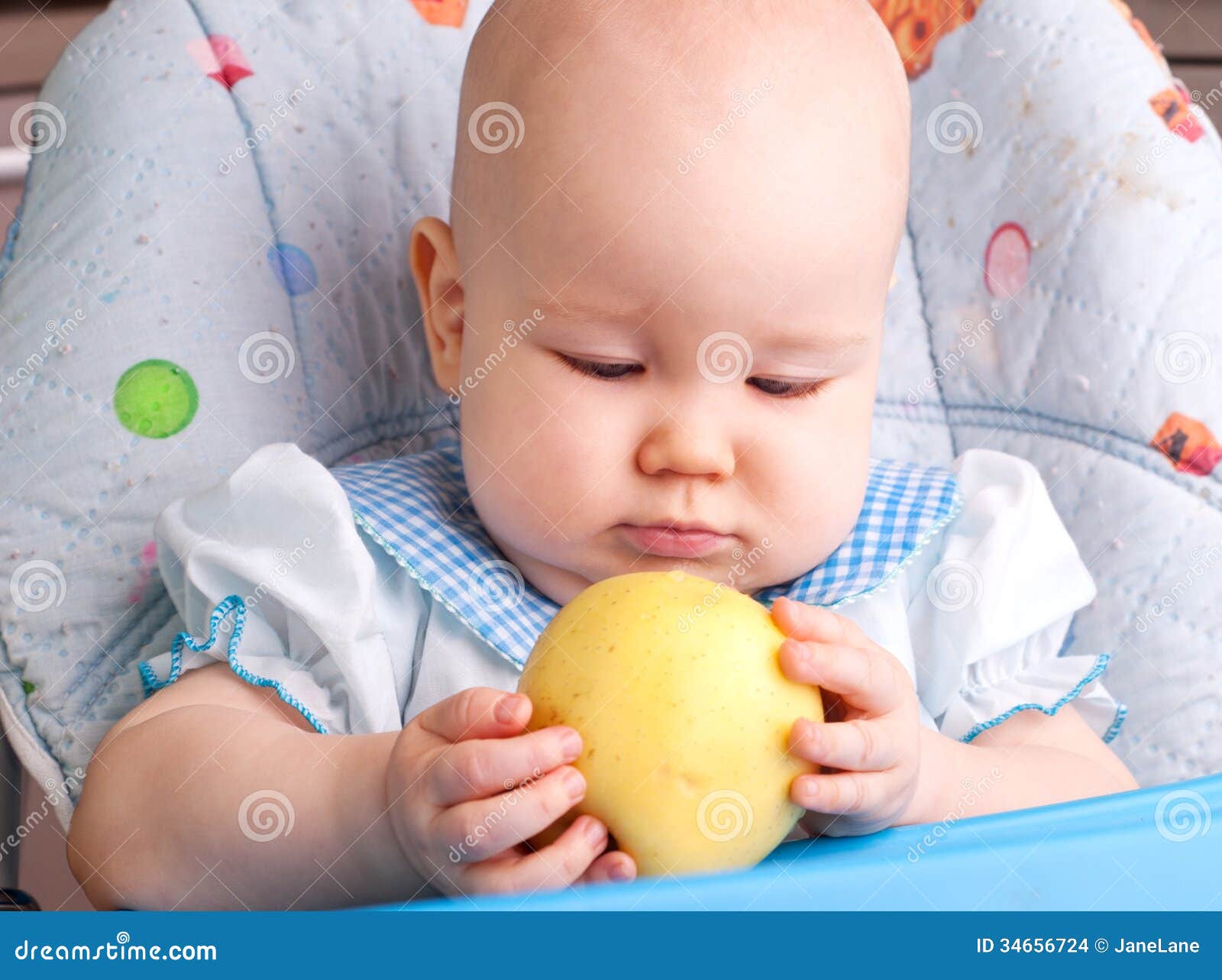 Baby with yellow apple stock photo. Image of beautiful 34656724