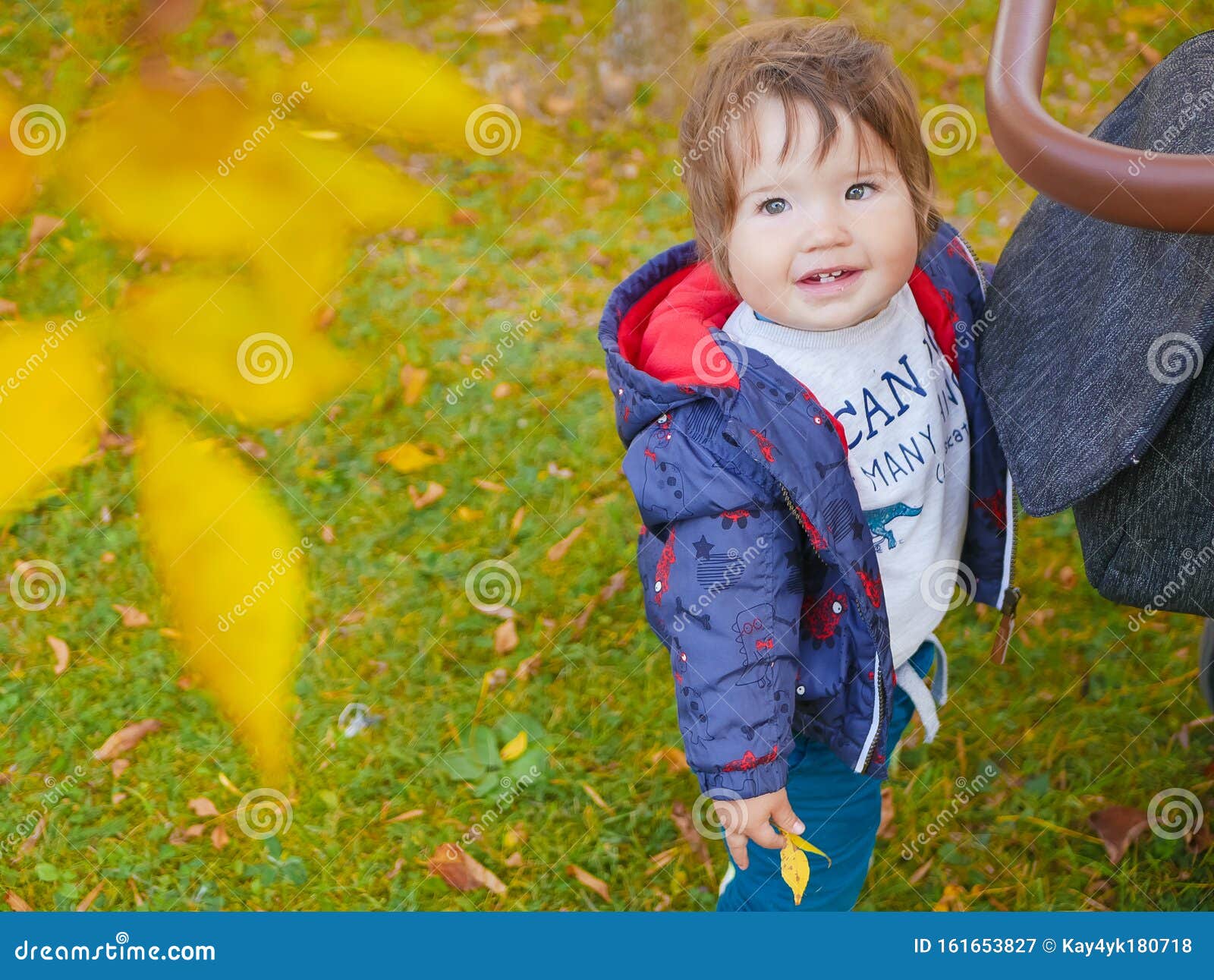 Baby and Yellow Leaf. Lovely Baby with Yellow Leaf Outdoors Stock Image ...