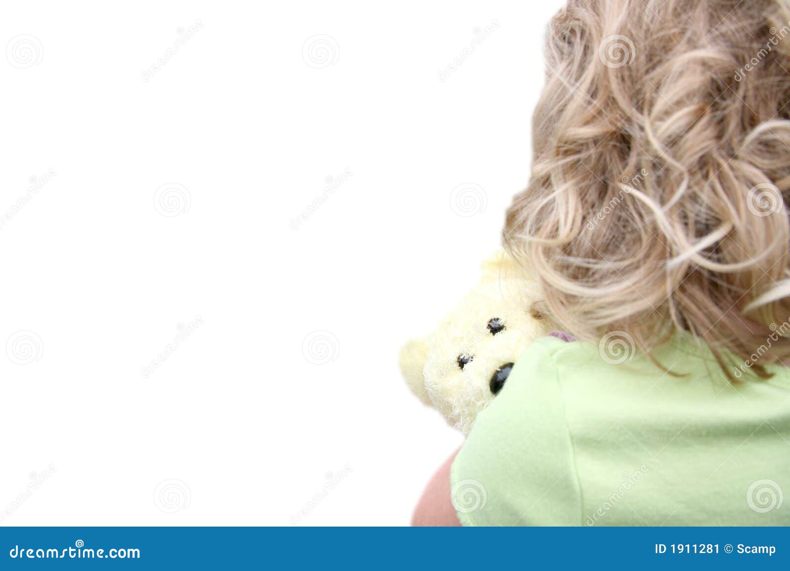 back of little girl holding teddy bear
