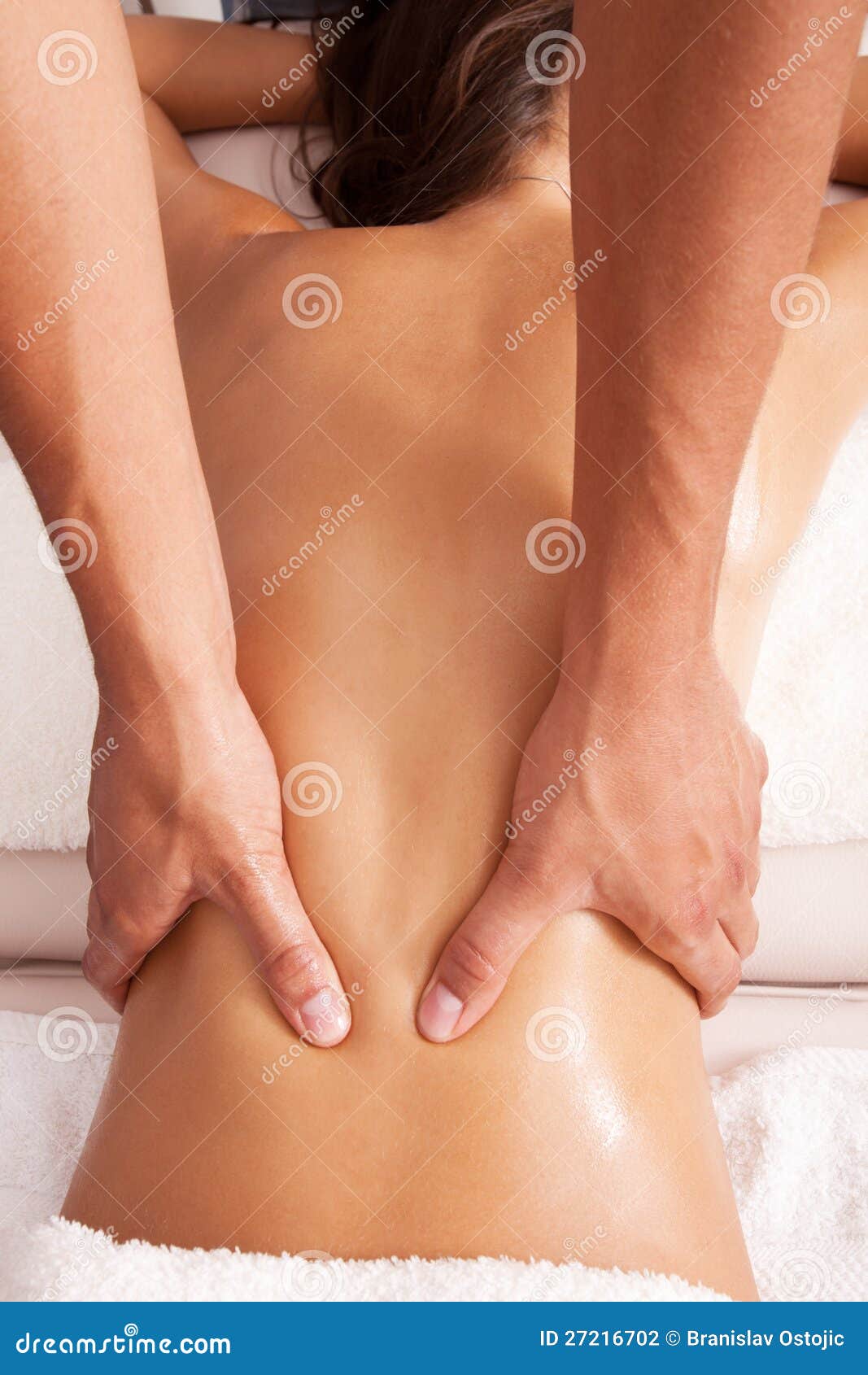 Lower back massage - Stock Image - C022/3243 - Science Photo Library