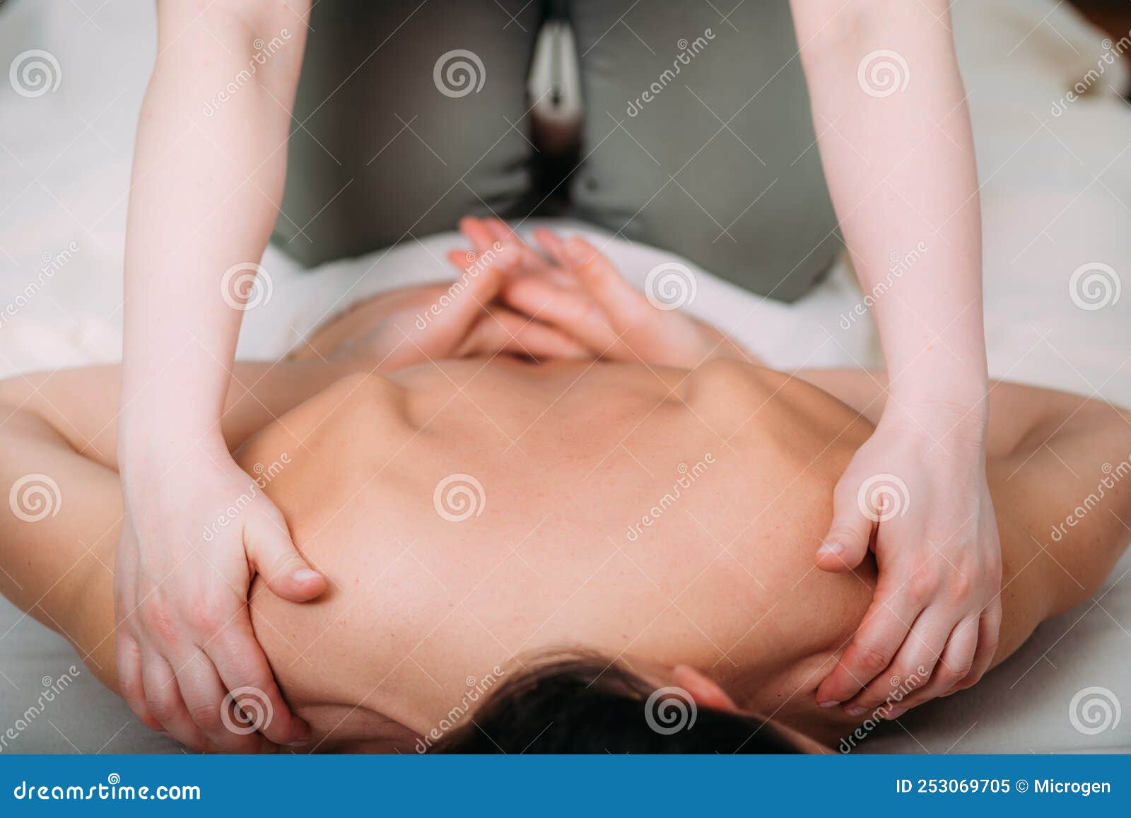 Relax Lower Back Massage Stock Photo by microgen