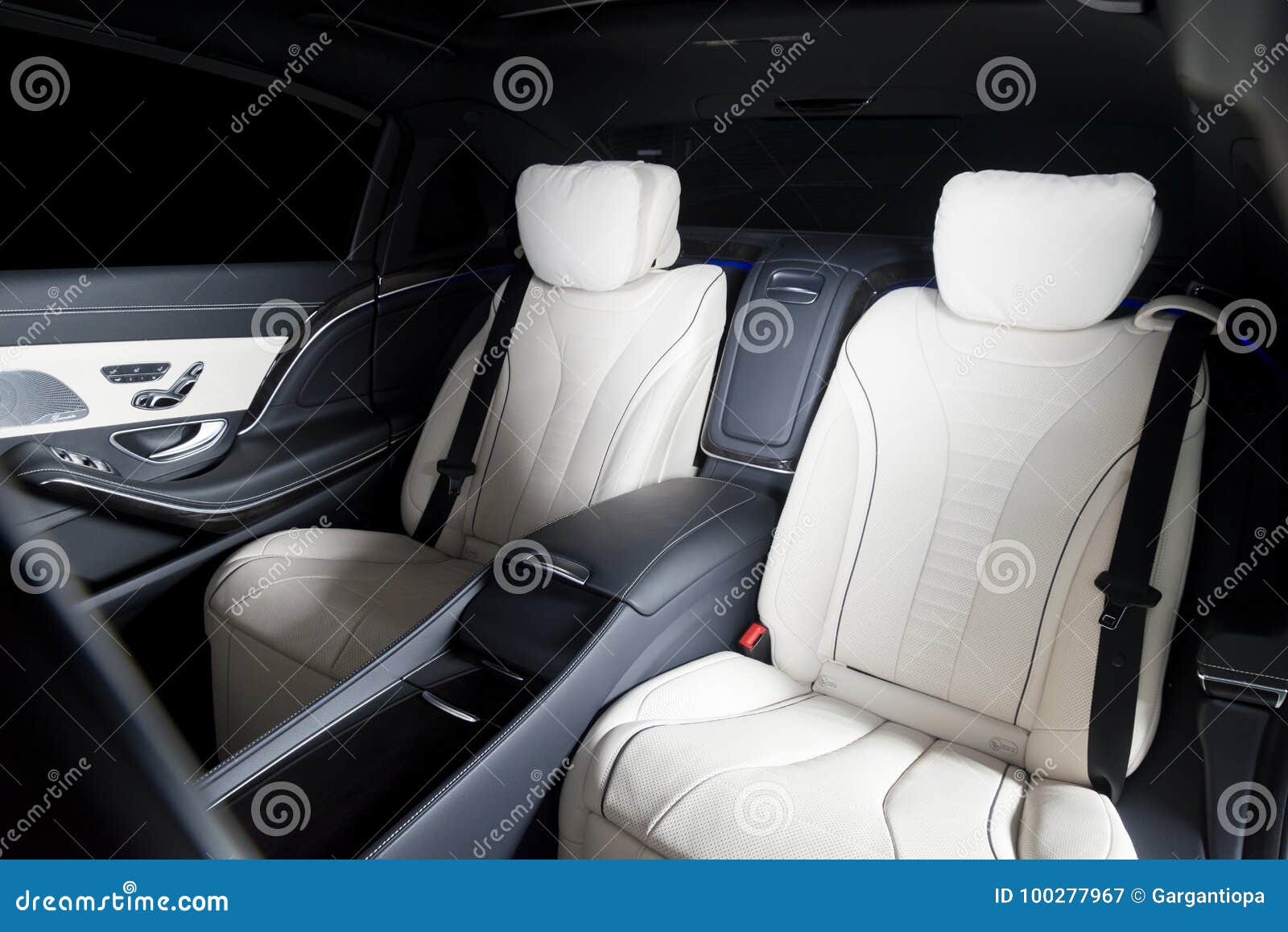 back seats of modern luxury car interior, black leather Stock Photo by  gargantiopa