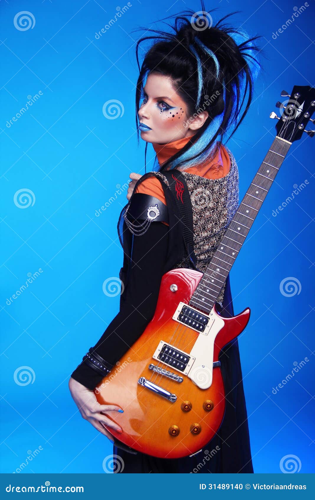 Back of Rock Emo Girl Posing with Electric Guitar on Bl Stock Photo