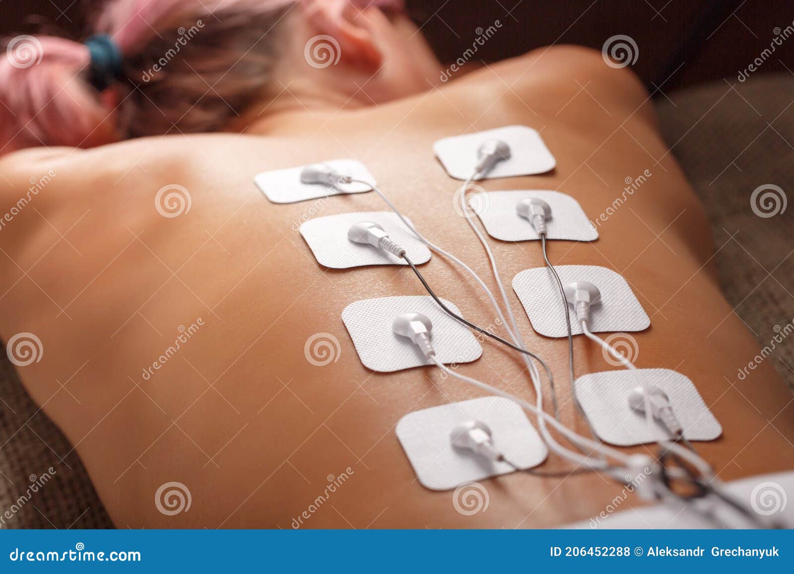 Muscle Stimulator with Electrodes, BacBack and Shoulder Massage with a Muscle  Stimulator with Attached Electrodes Along Stock Photo - Image of luxury,  electric: 206309420