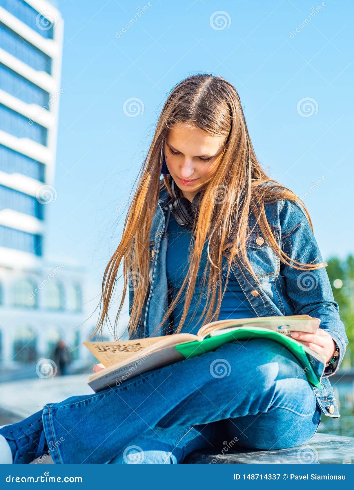 Back To School Student Teenager Girl Reads a Textbook. Outdoor Portrait ...