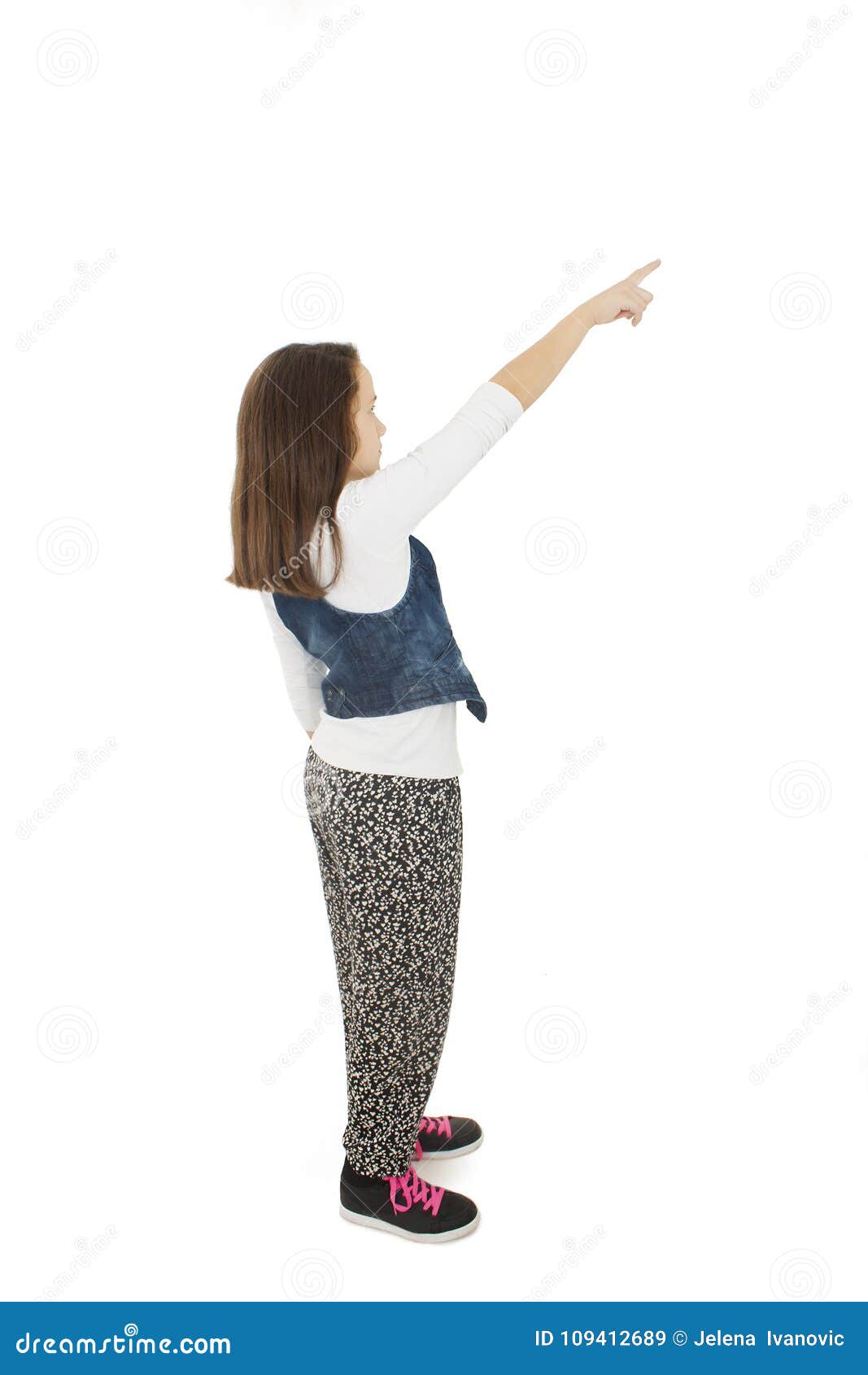 Back View of Beautiful Girl Points at Wall. Rear View Stock Image ...