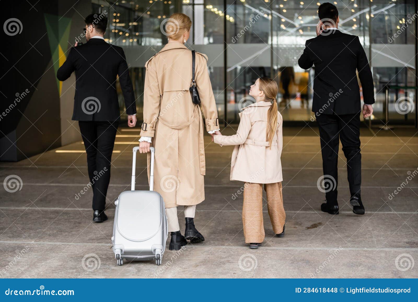 Back View of Bodyguards Walking Next Stock Photo Image of suits
