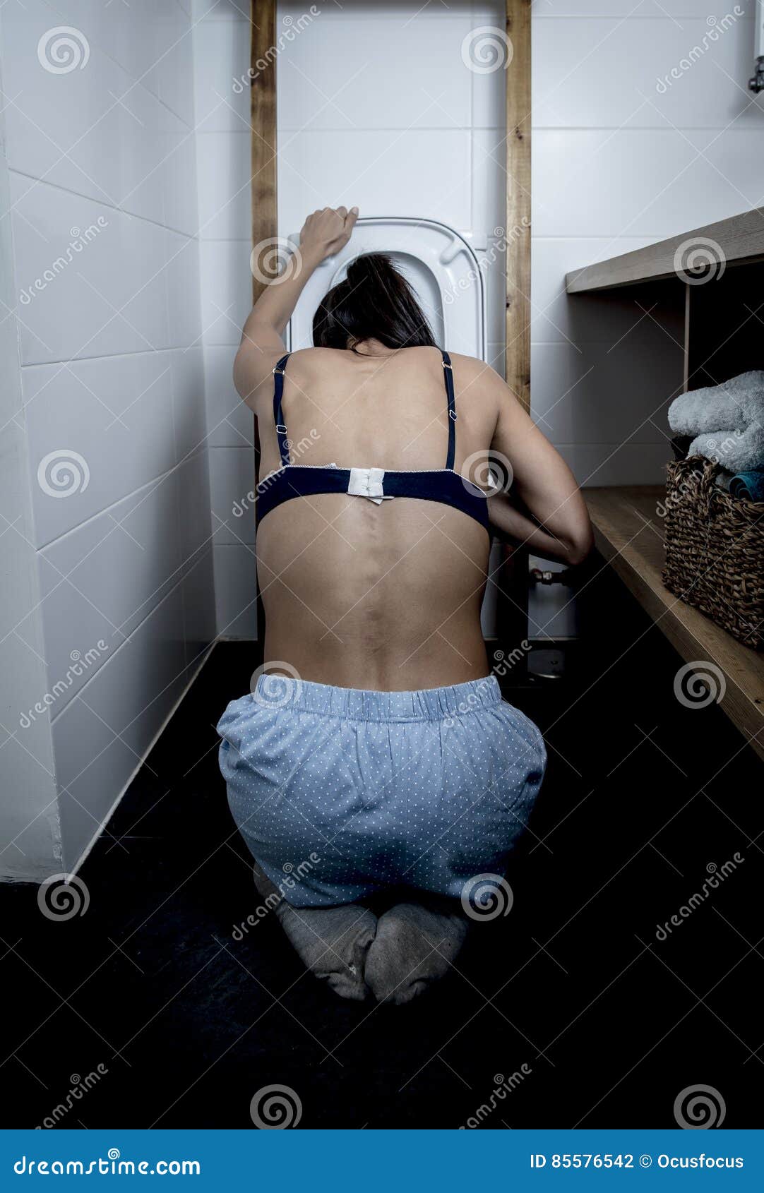 Back View of Bulimic Woman Feeling Sick Vomiting and Throwing Up ...