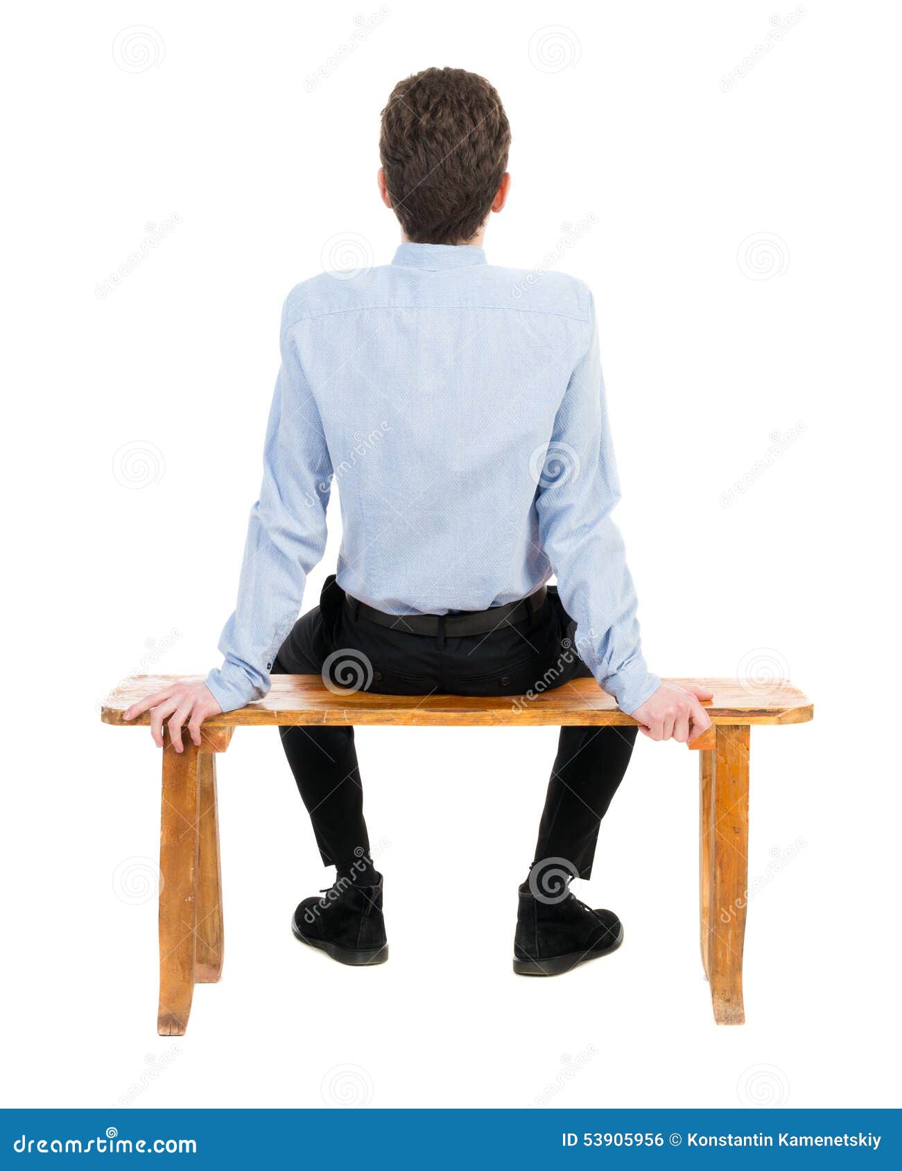  Isolated over white background. Businessman resting on a wooden bench