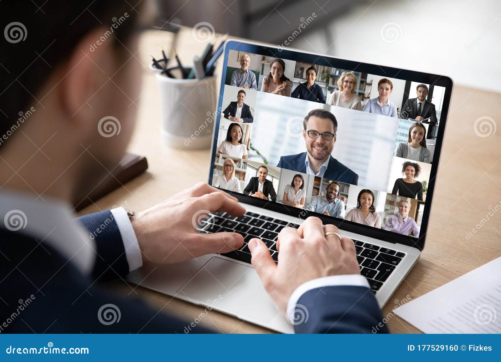 back view of employee have online web conference with colleagues