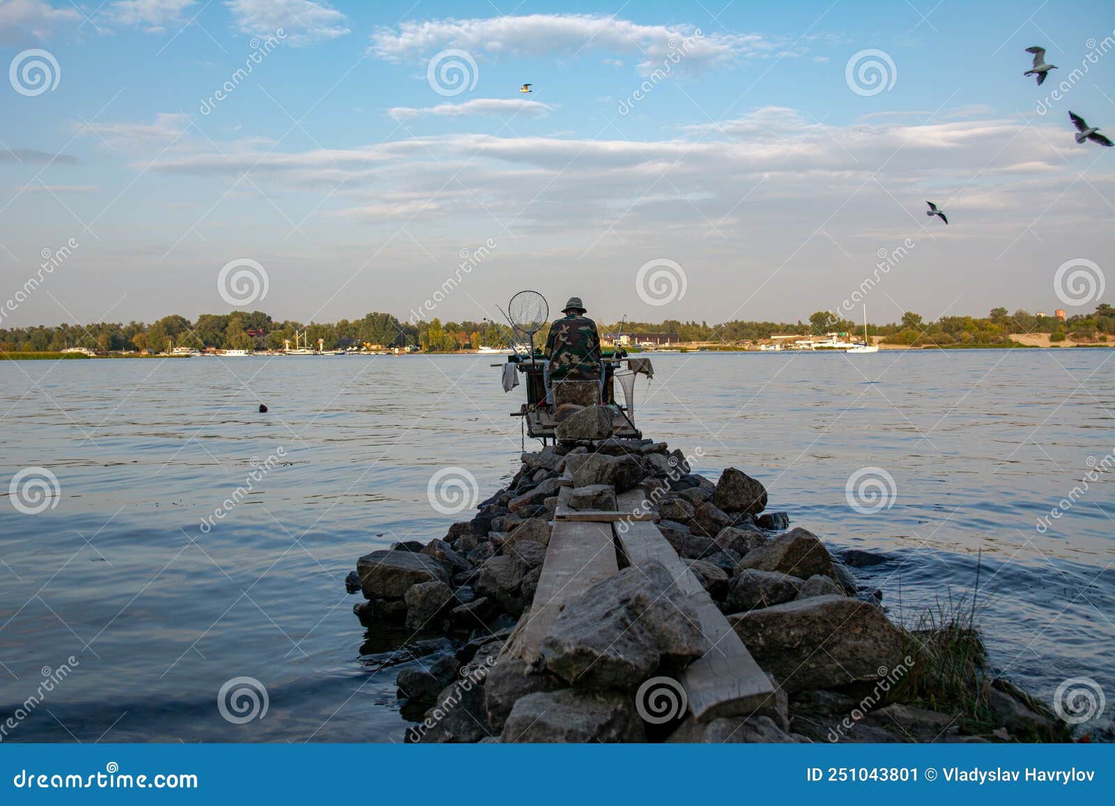 Back View of Fisherman with a Lot of Fishing Rods and a Net for Fish.  Fishing on the River Stock Image - Image of summer, back: 251043801