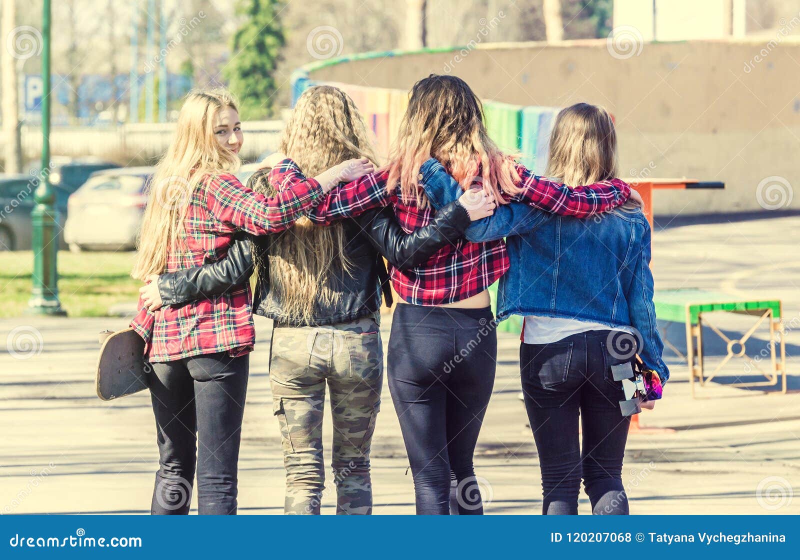 Back View of Four Girl Friends Hugging Stock Photo - Image of ...