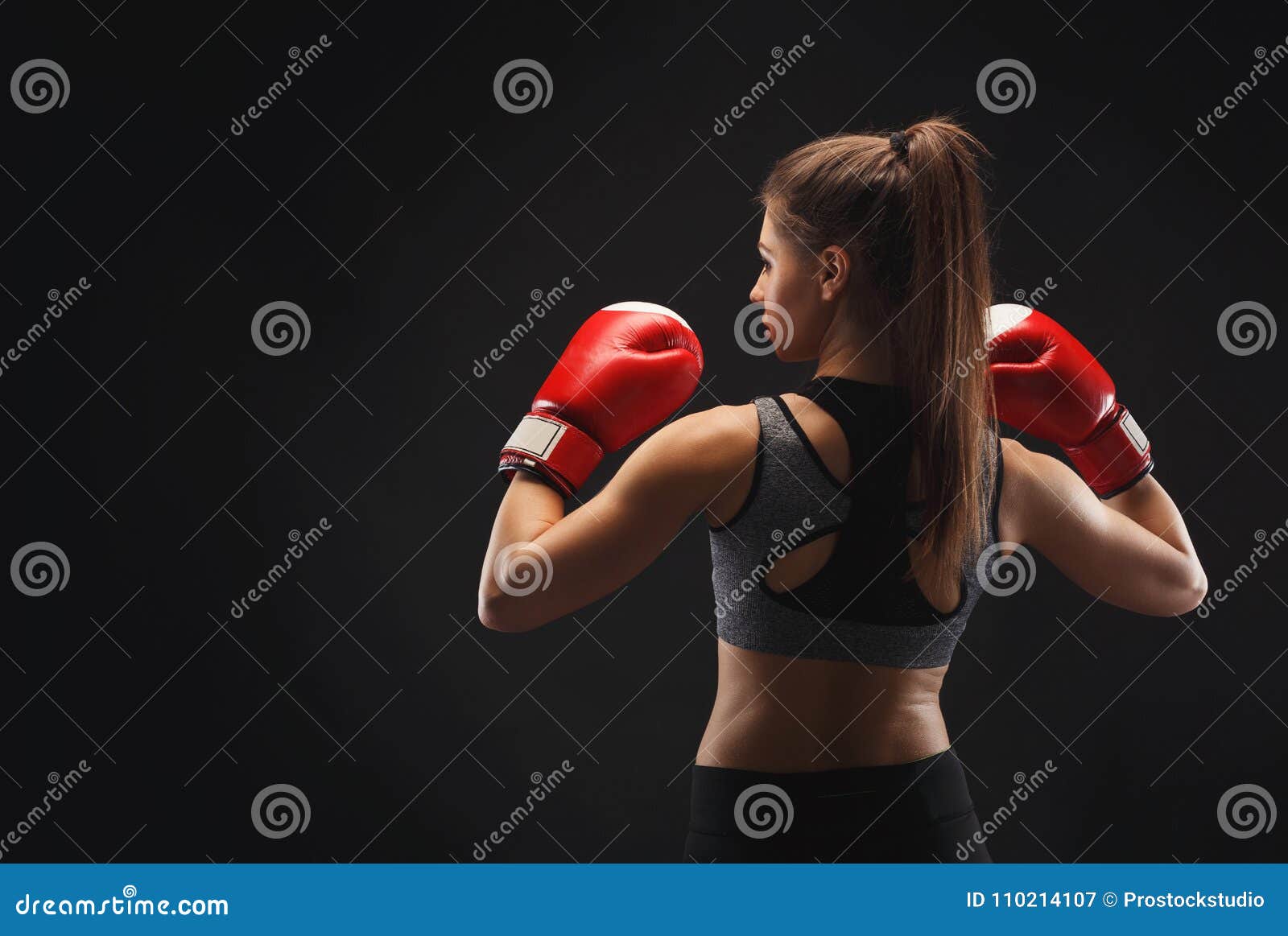 Download Back View Of A Gorgeous Young Woman With Boxing Gloves ...