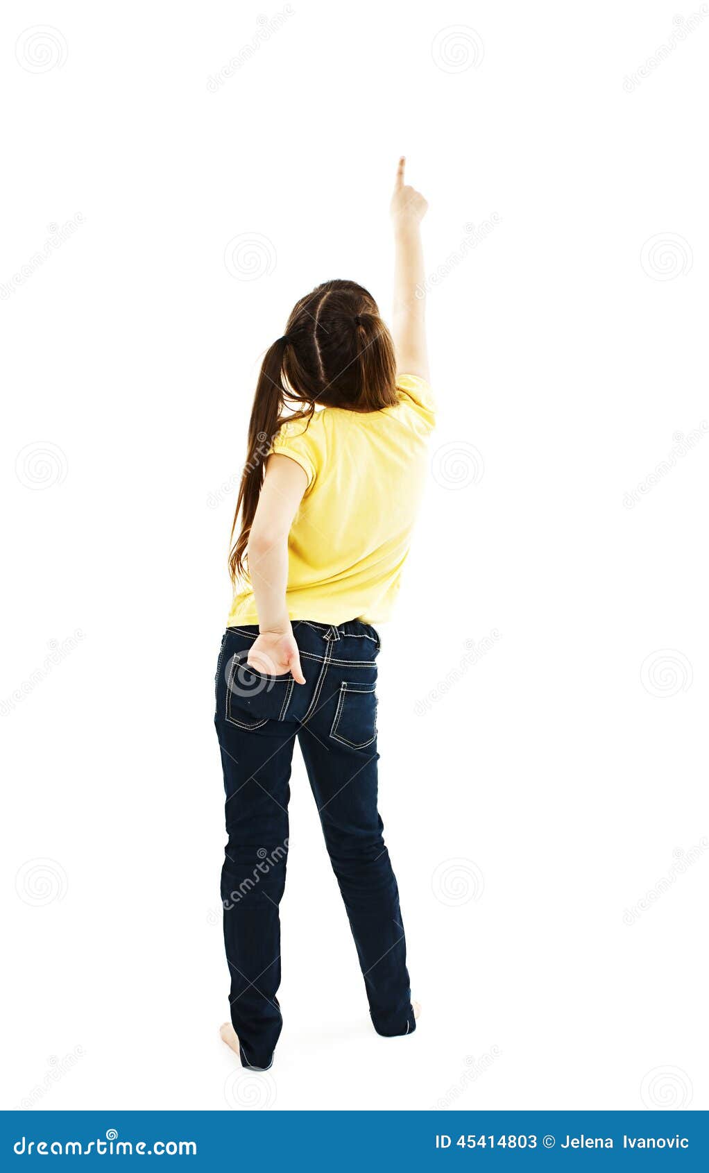 Back View of Little Girl Points at Wall. Rear View Stock Image Image