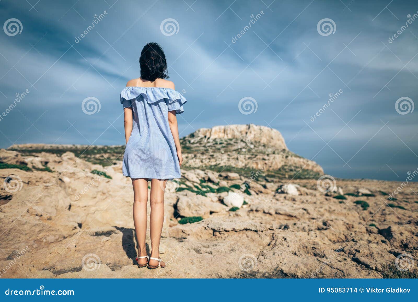 Back View of Lonely Woman Standing on Rocky Desert Stock Photo - Image ...