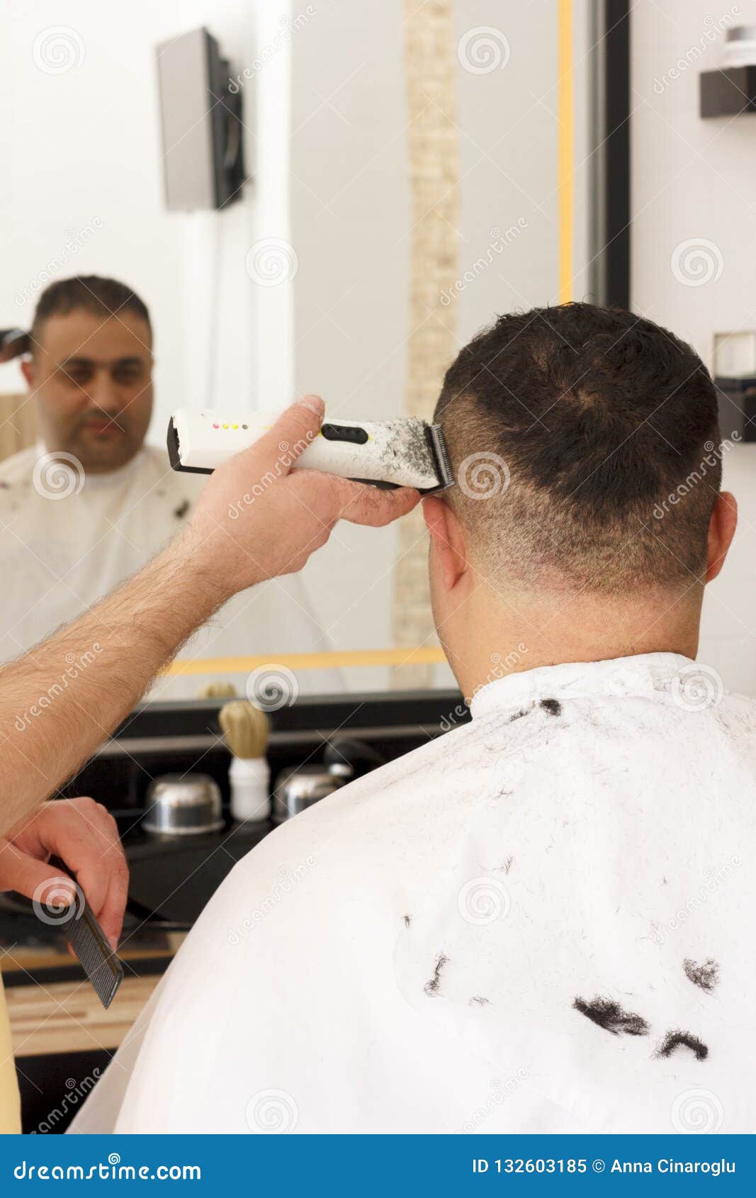 Back View Of Man Getting Short Hair Trimming At Barber Shop With
