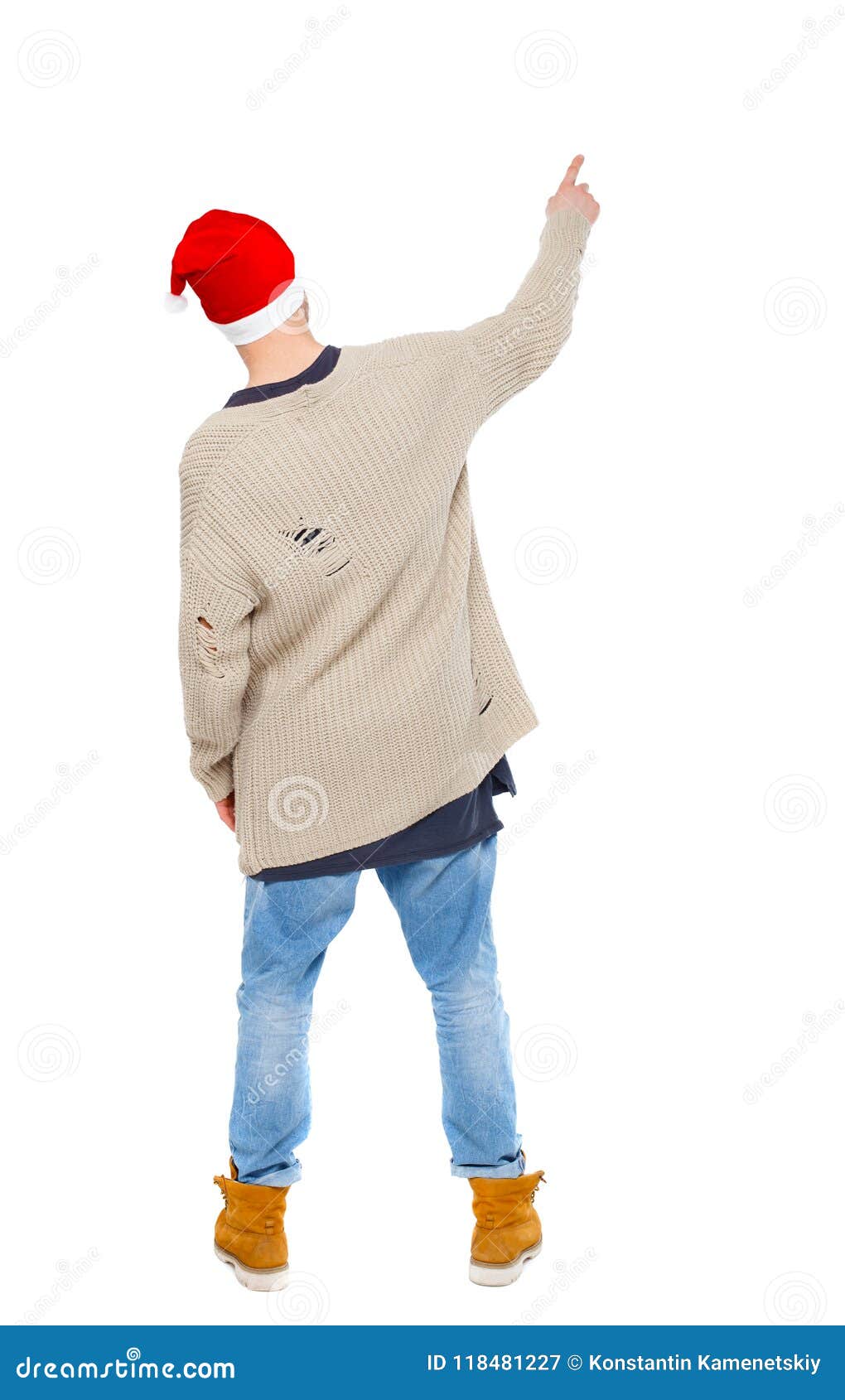Back View of a Man in a Santa Claus Hat Pointing Upwards. Stock Image ...