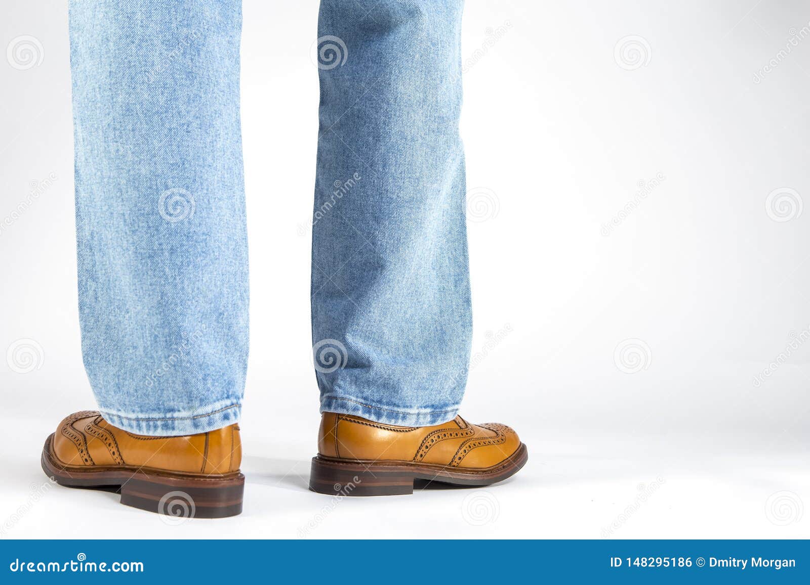 Back View of Mens Legs in Brown Oxford Brogue Shoes. Posing in Blue ...