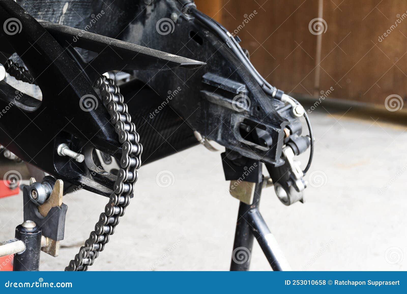 Back View Motorcycle Up To Stand To Remove Wheel To Change Tire Stock